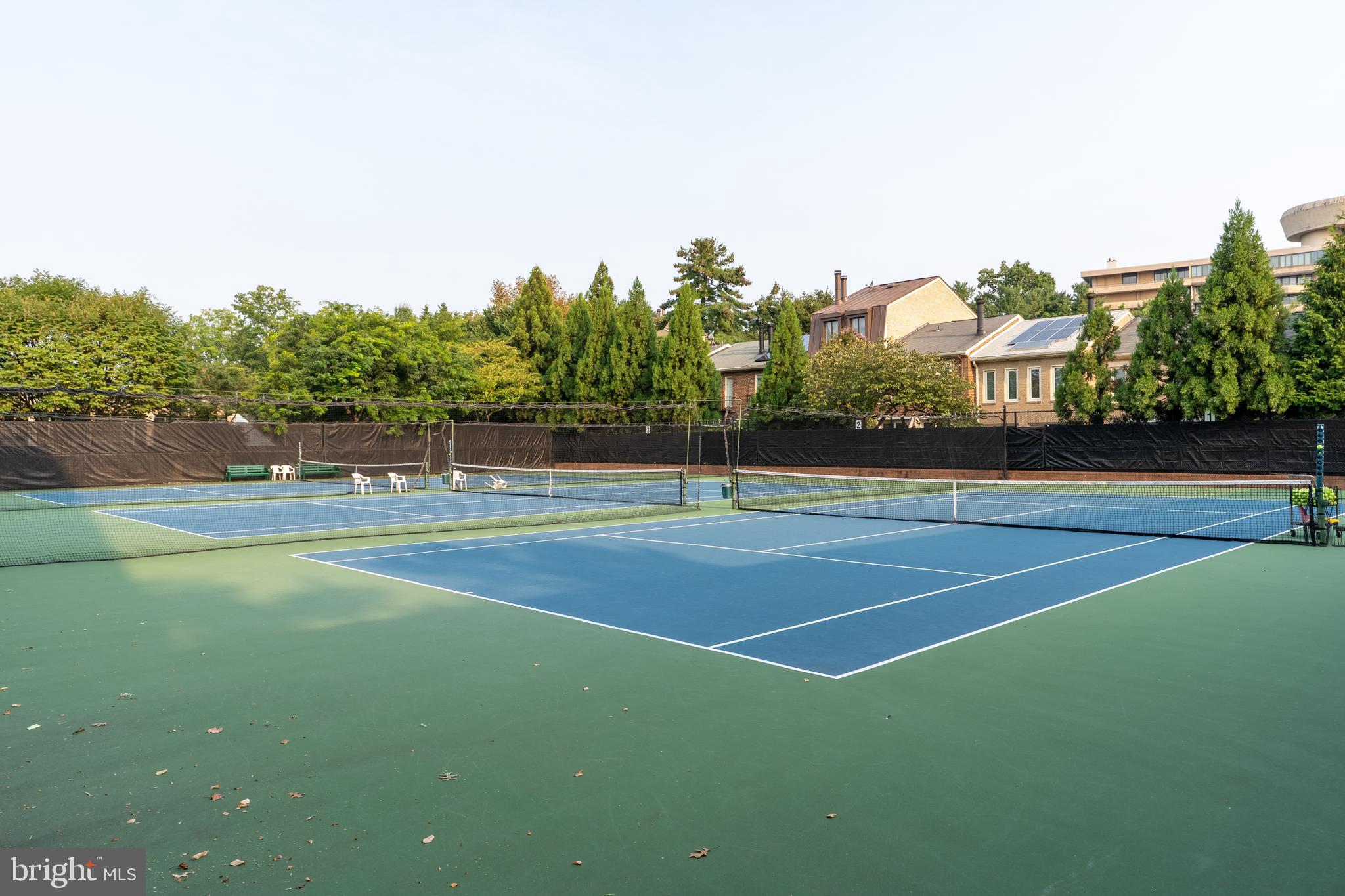 3299 Sutton Place Northwest, Unit C Washington, DC 20016 - Photo 37 of 41 a view of a tennis court