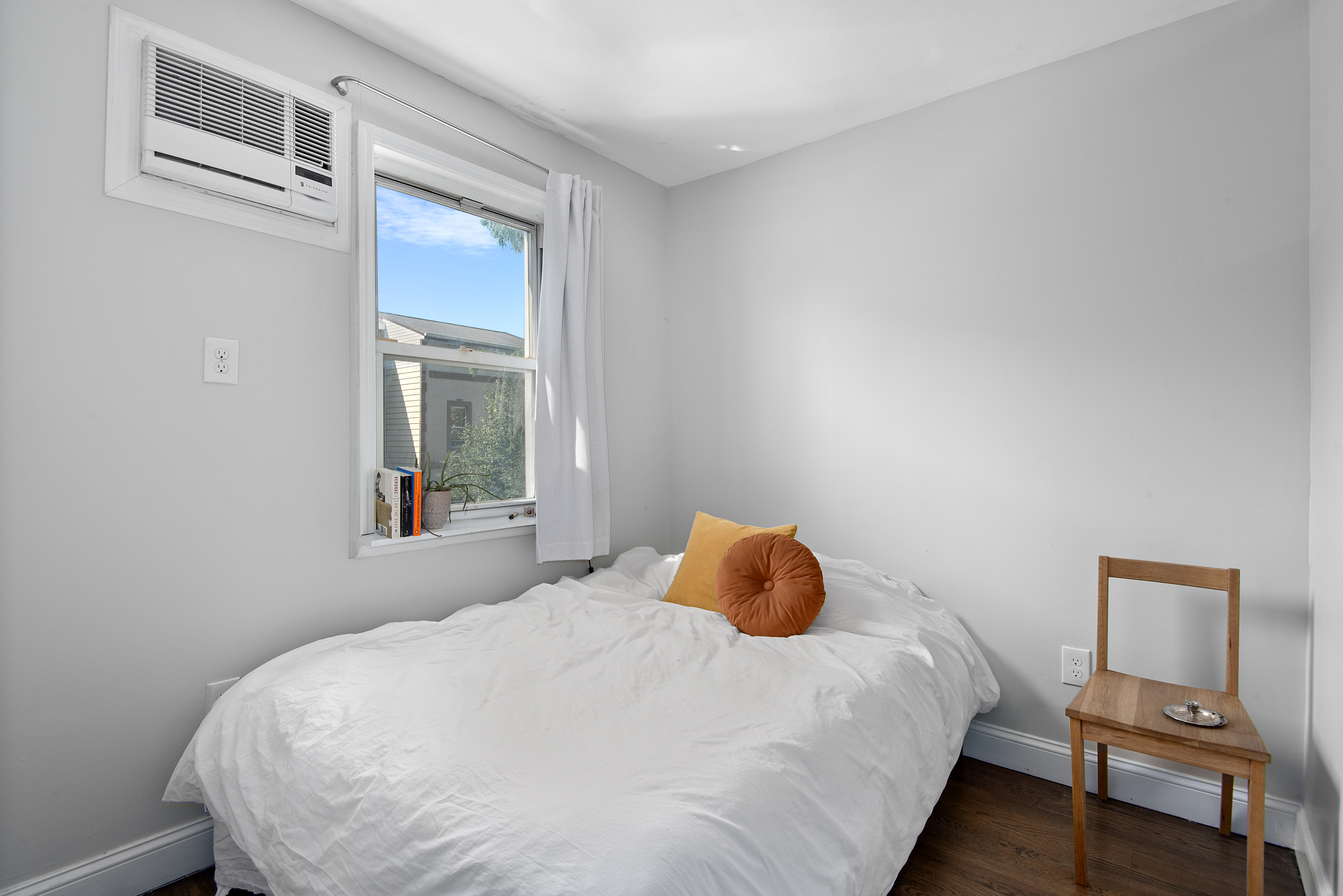 269 Ainslie Street, Unit 2 Brooklyn, NY 11211 - Photo 5 of 11 a bedroom with a bed and a window