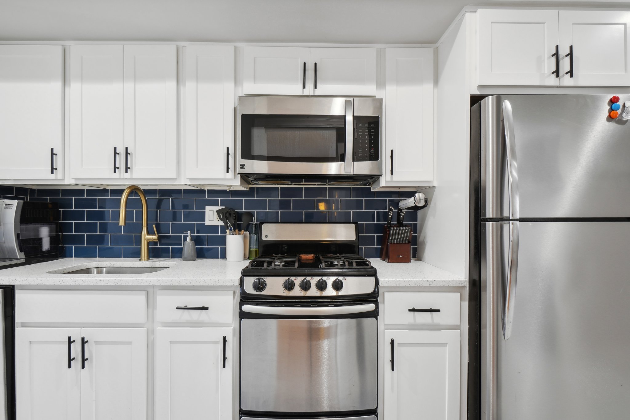 123 17th Street Southeast Washington, DC 20003 - Photo 2 of 18 a kitchen with stainless steel appliances a stove and a refrigerator