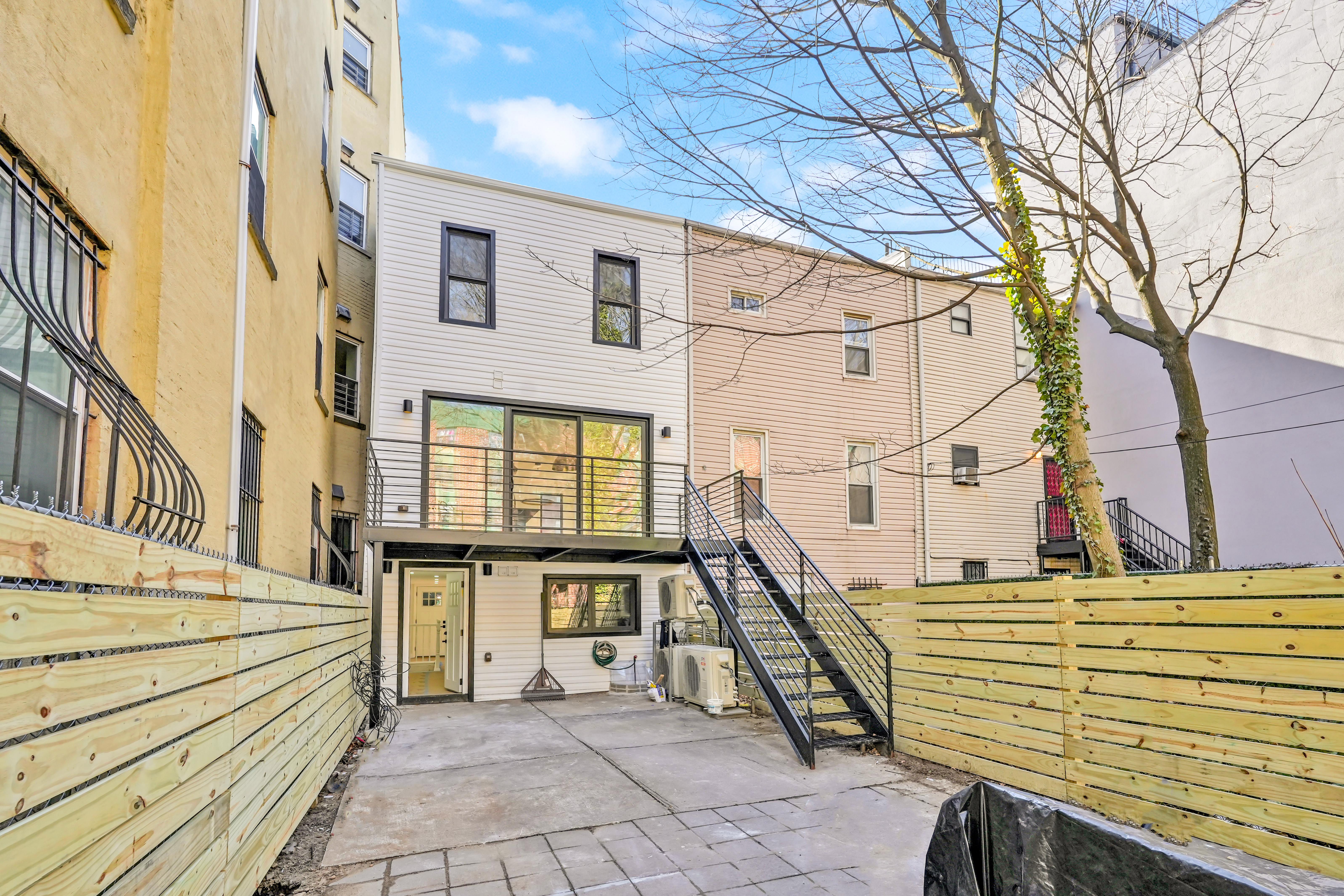 473 Monroe Street Brooklyn, NY 11221 - Photo 38 of 40 a view of a brick building with many windows