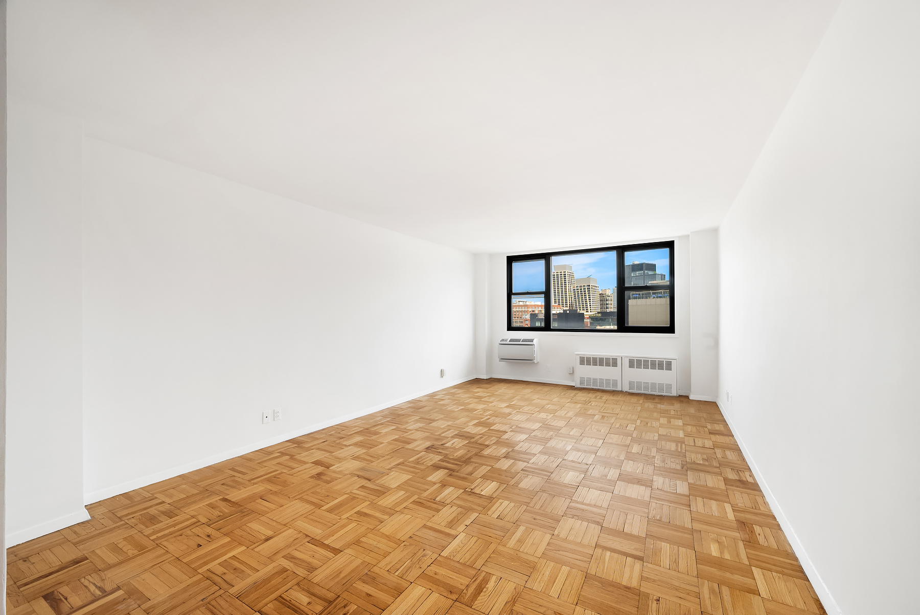 61 Jane Street, Unit 15K Manhattan, NY 10014 - Photo 5 of 16 a view of a room with a window