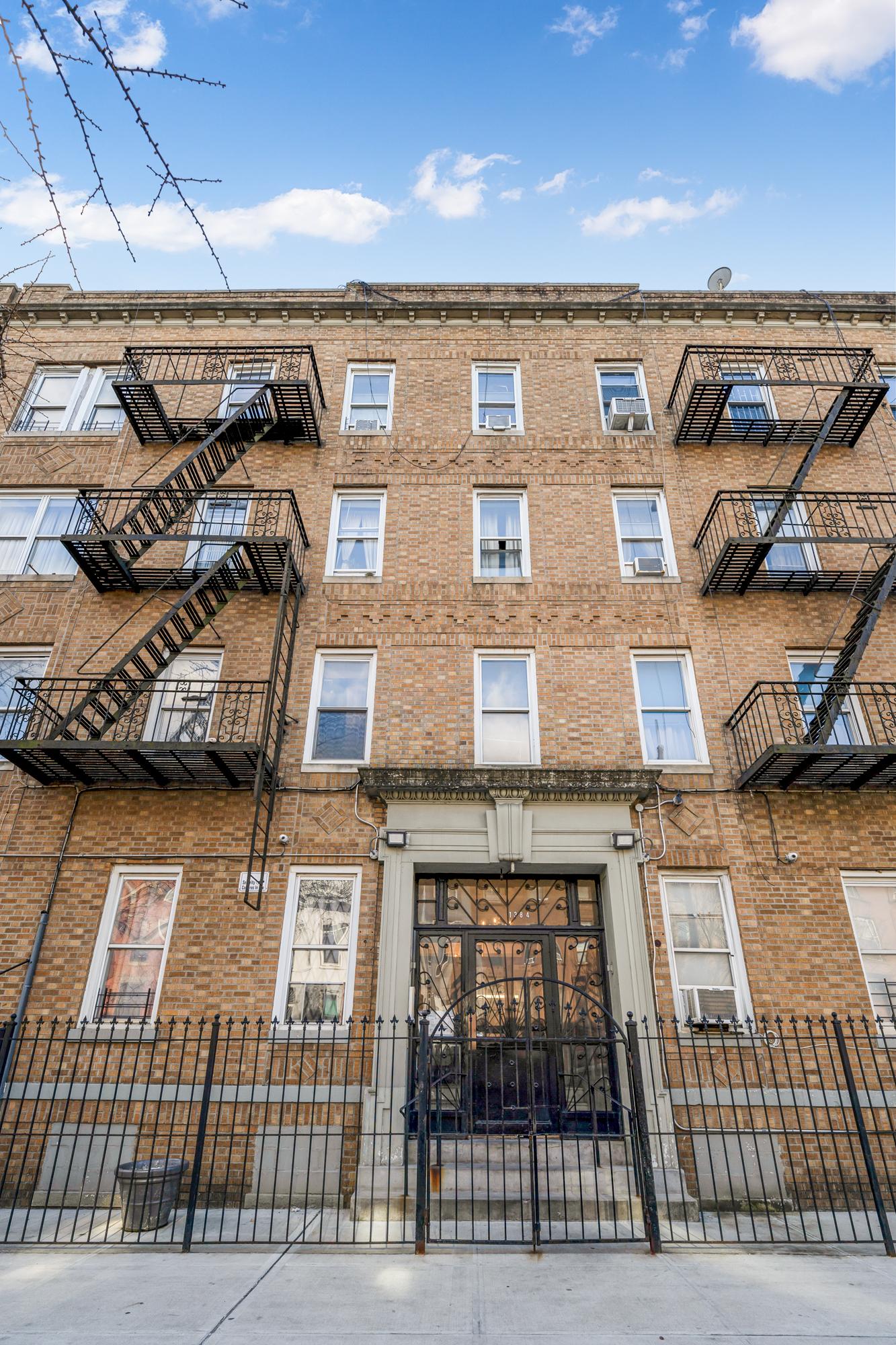 1384 Pacific Street, Unit A2 Brooklyn, NY 11216 - Photo 14 of 16 a view of a building with outdoor space