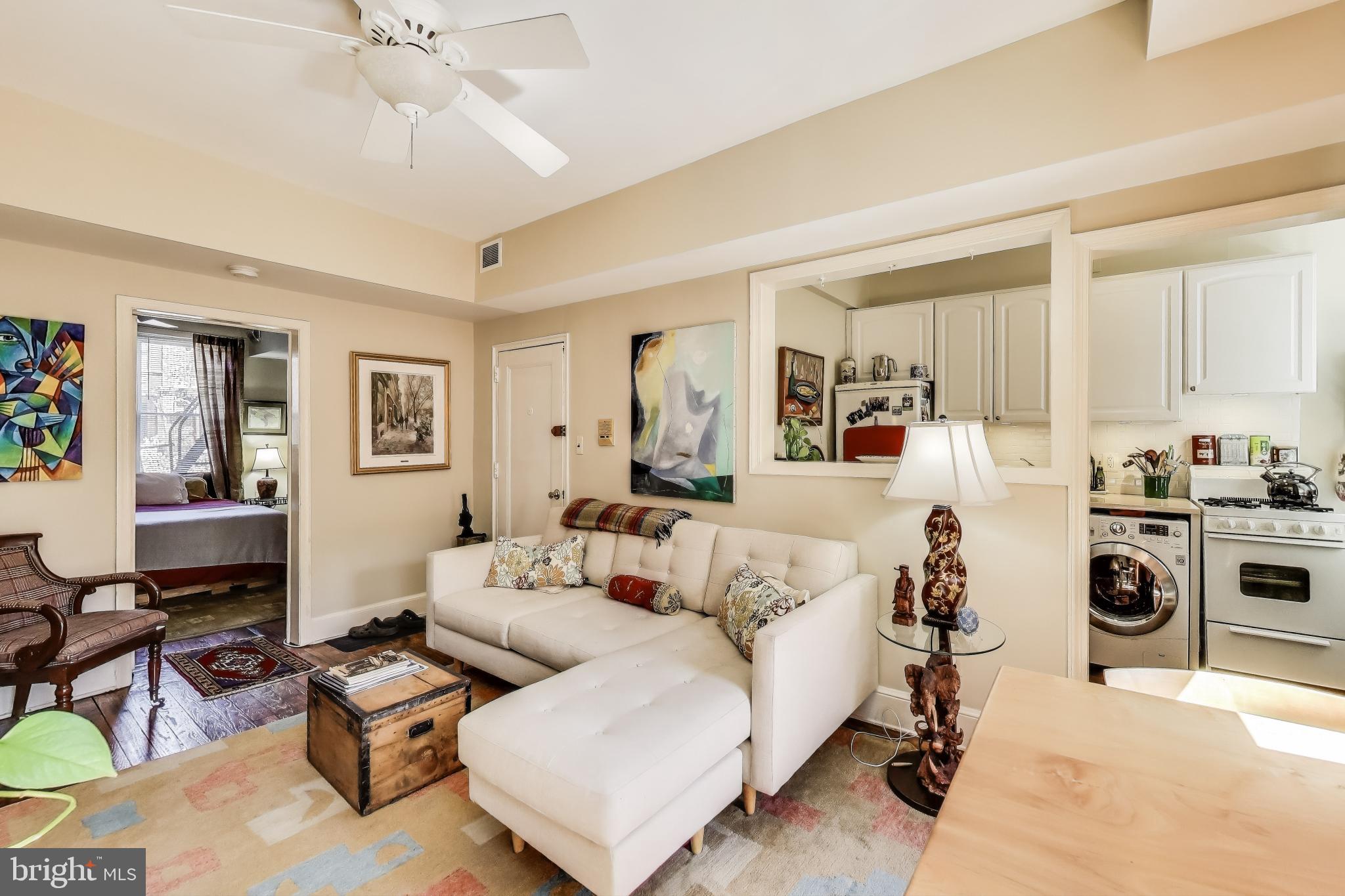 1317 Corcoran Street Northwest Washington, DC 20009 - Photo 10 of 47 a living room with furniture