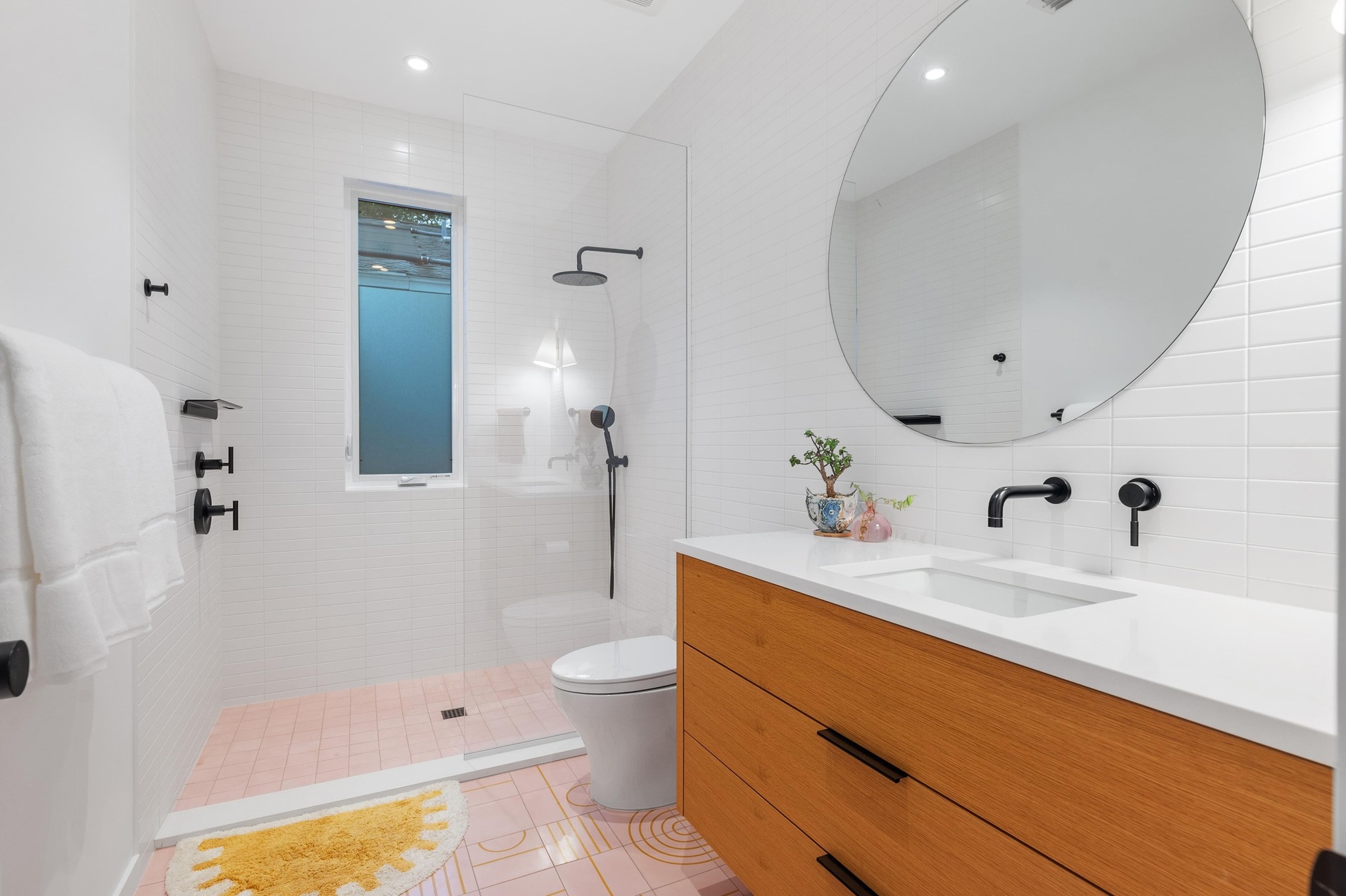 1206 Bickler Road Austin, TX 78704 - Photo 46 of 65 a bathroom with a sink a toilet and shower