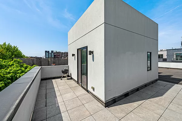 a view of a terrace with a bench
