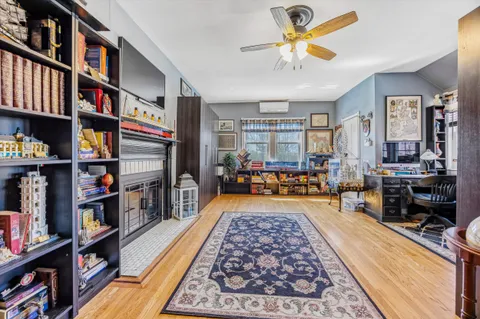 a bathroom with a sink a toilet and a shower
