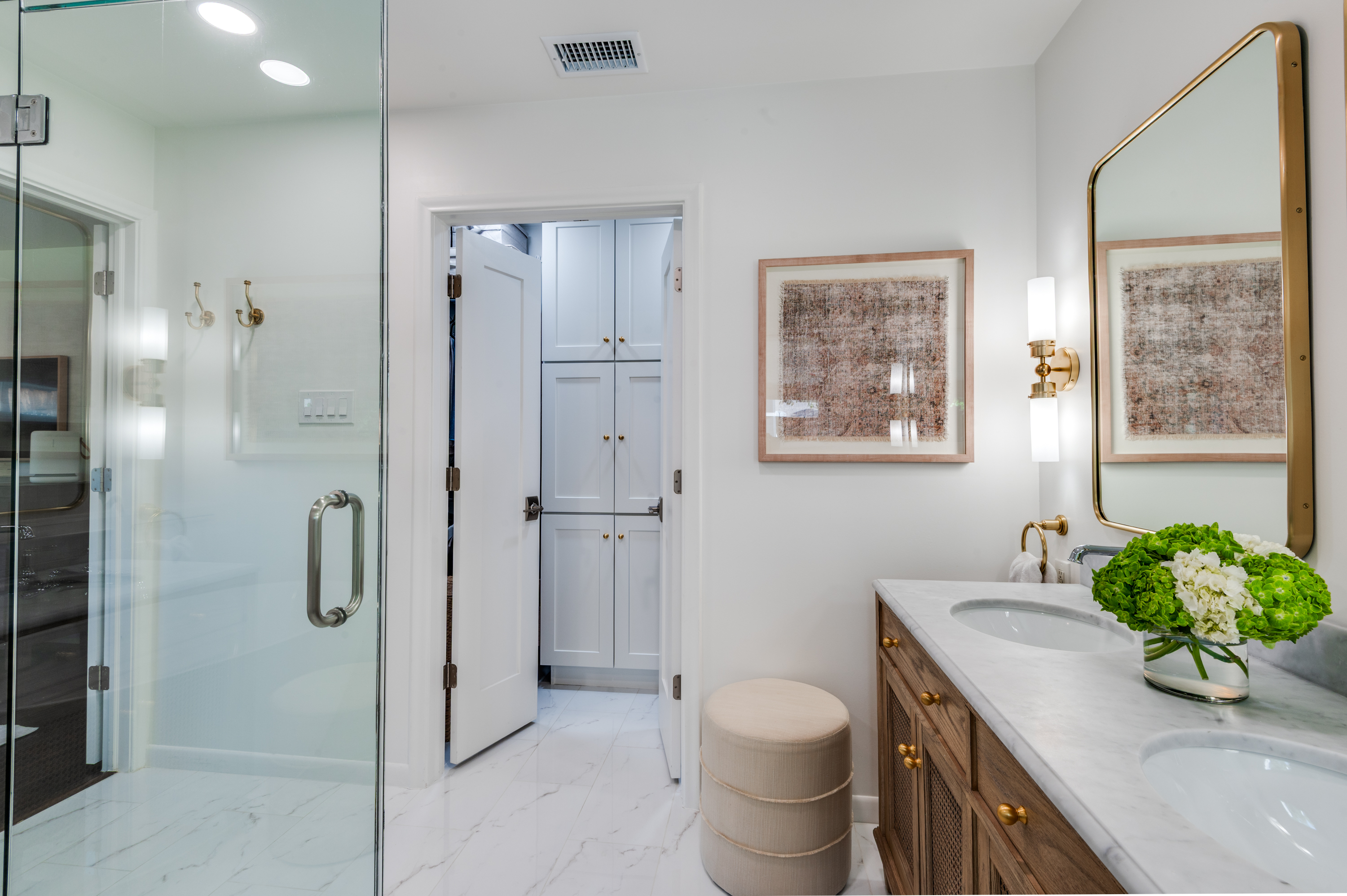 3363 Merrell Road Dallas, TX 75229 - Photo 19 of 29 a bathroom with a granite countertop sink a toilet a mirror and shower