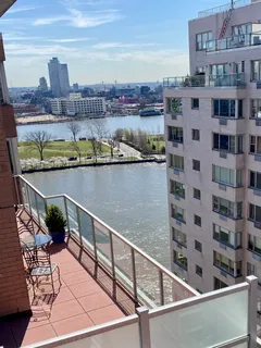 a view of a lake with a terrace