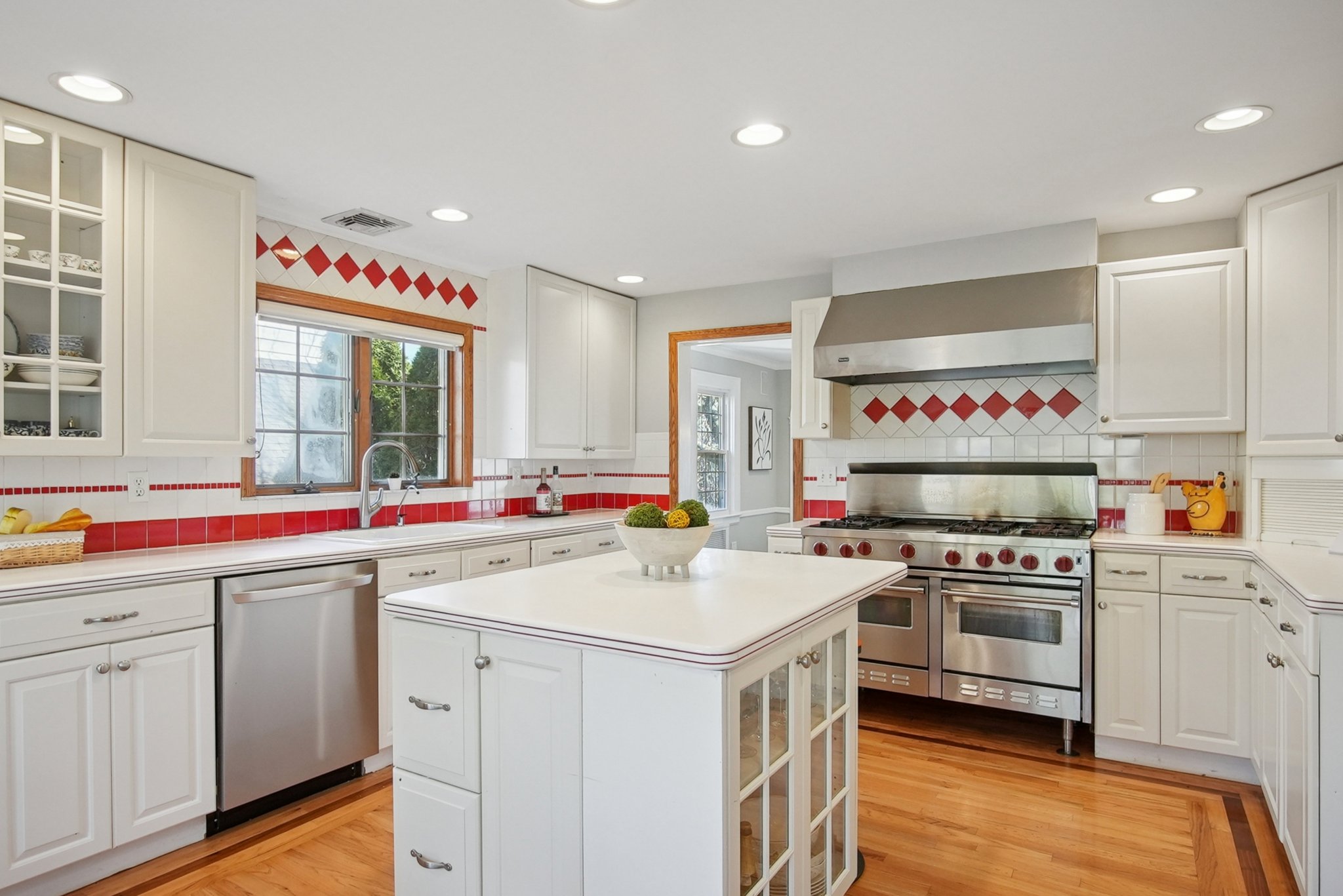 877 Ridgewood Road Millburn, NJ 07041 - Photo 11 of 37 a kitchen with a sink a stove and cabinets