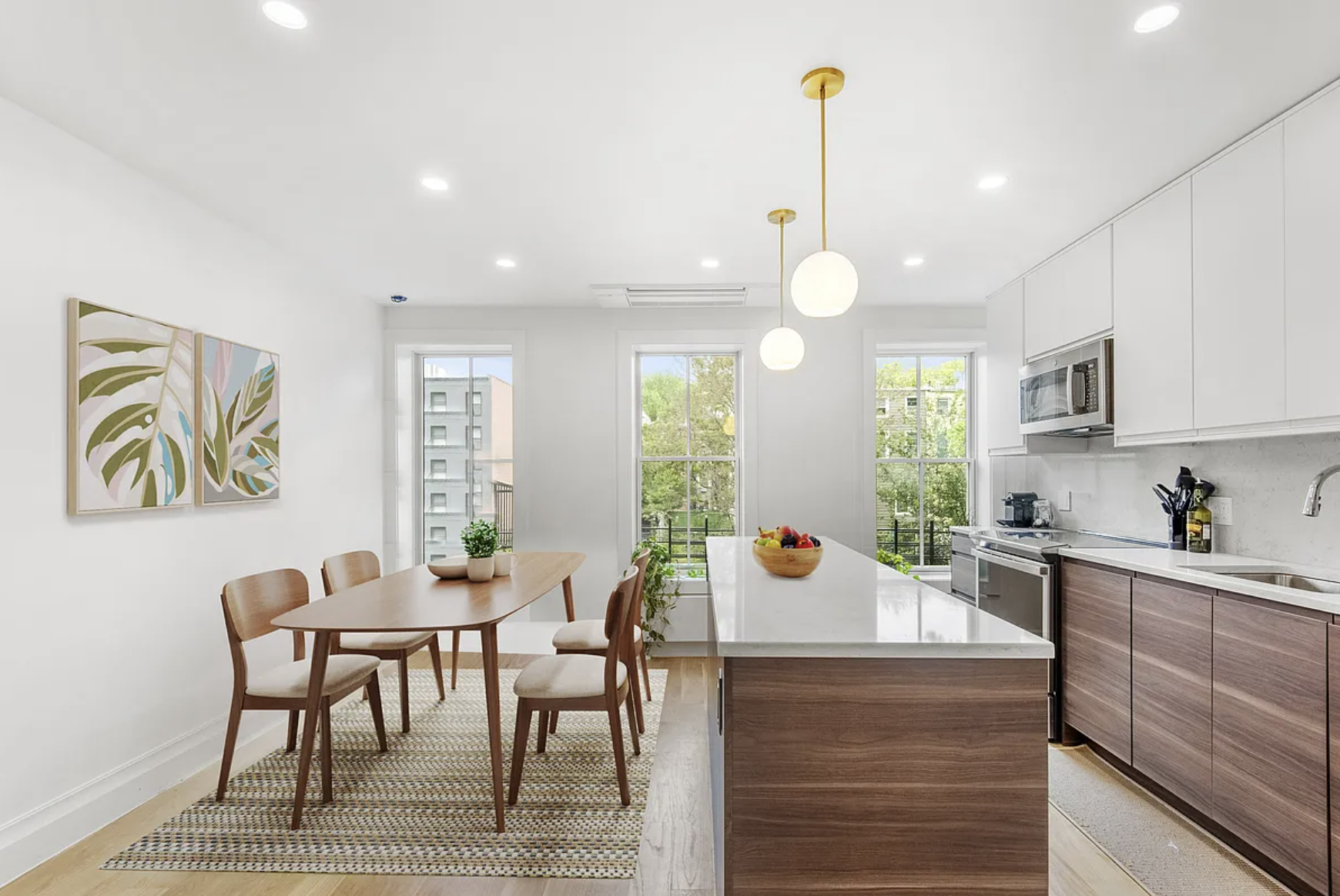 169 Putnam Avenue, Unit 2 Brooklyn, NY 11216 - Photo 2 of 10 a view of a a dining room with furniture window and wooden floor