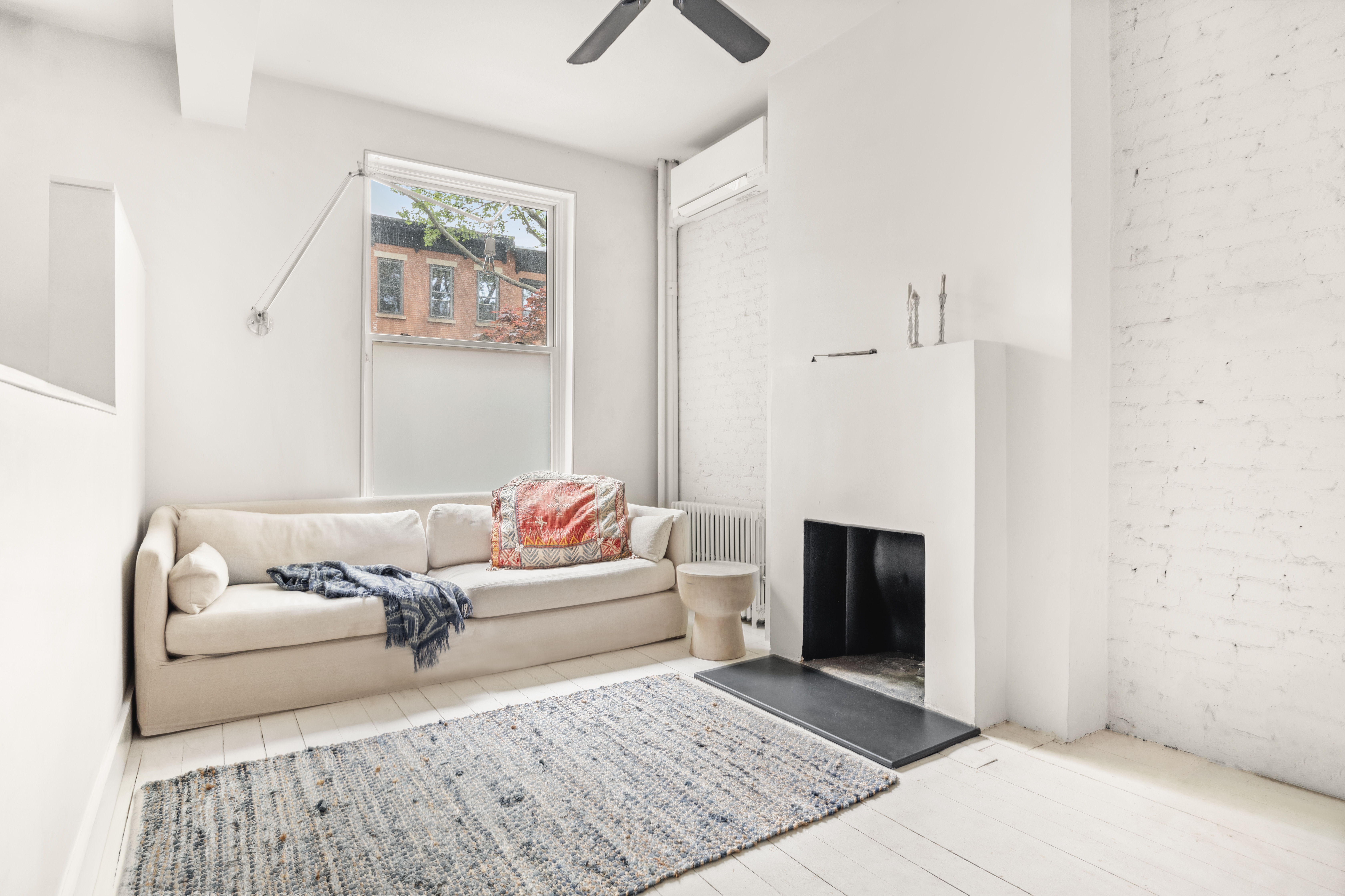 26 A 1st Street Brooklyn, NY 11231 - Photo 3 of 20 a living room with furniture and a fireplace