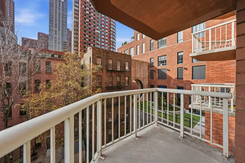 a view of a balcony with city view