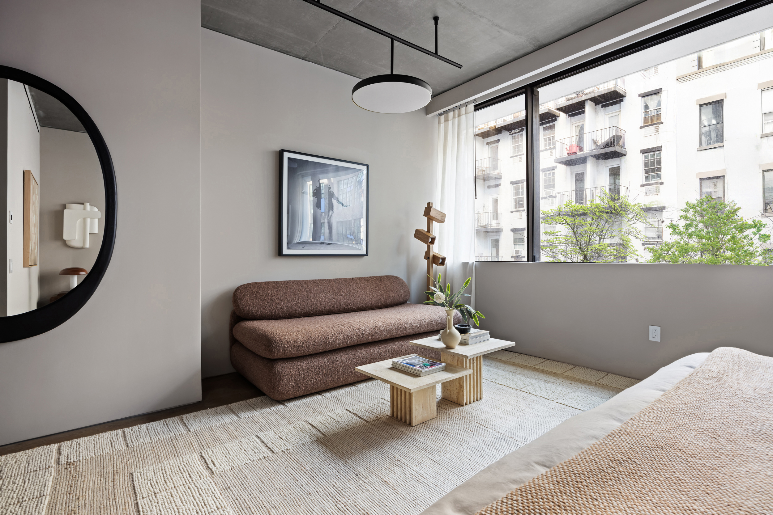 455 West 19th Street, Unit 3 Manhattan, NY 10011 - Photo 21 of 30 a living room with furniture and a window