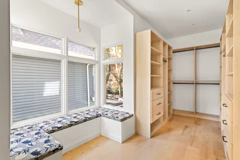 a spacious bathroom with a tub and shower