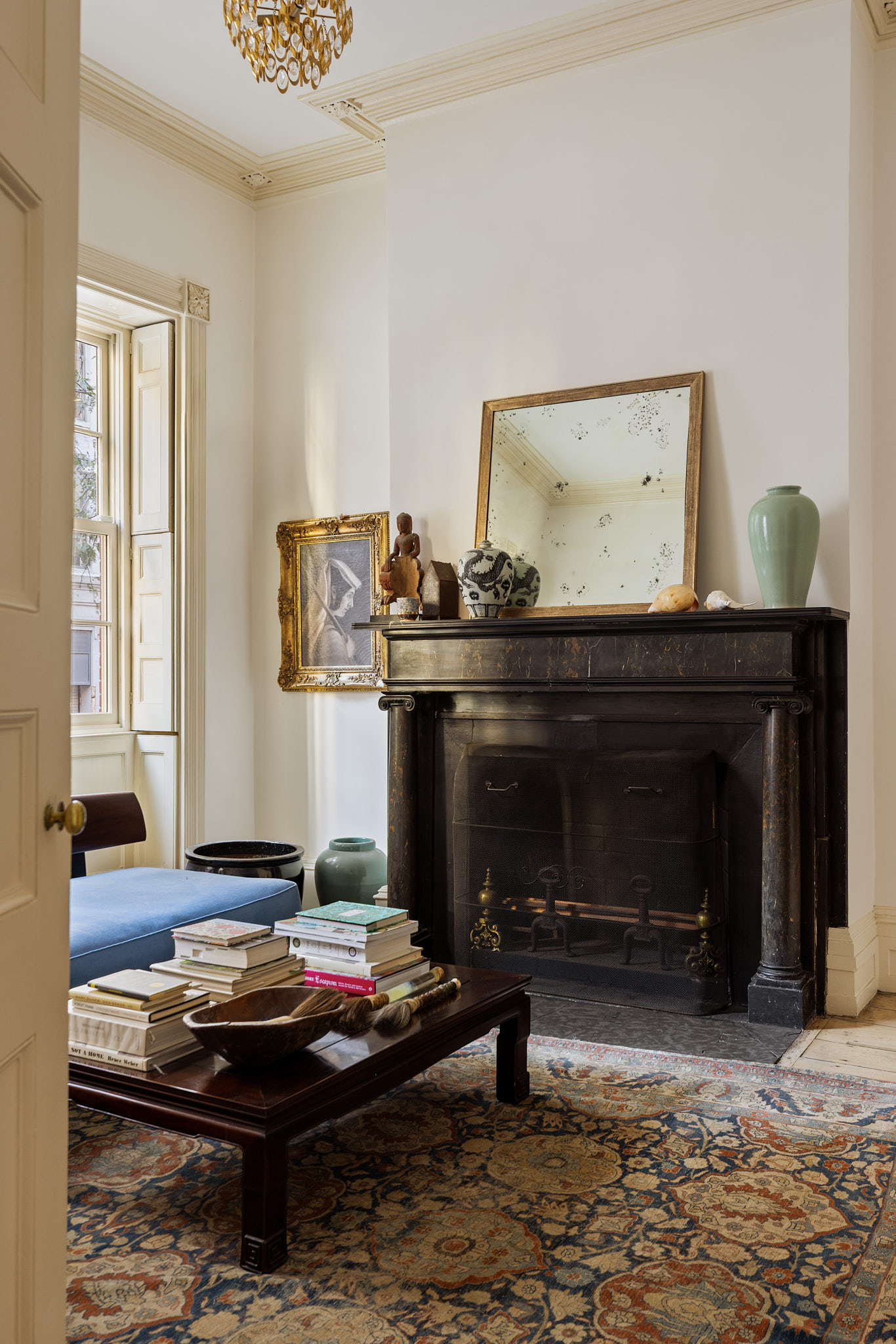 13 Vandam Street Manhattan, NY 10014 - Photo 3 of 26 a living room with furniture and a fireplace