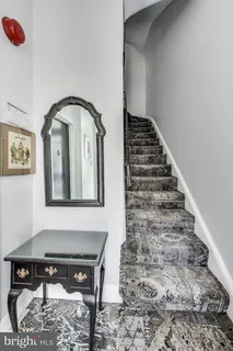 a view of entryway with a front door