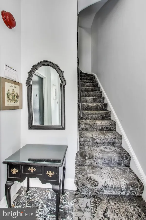 a view of entryway with a front door