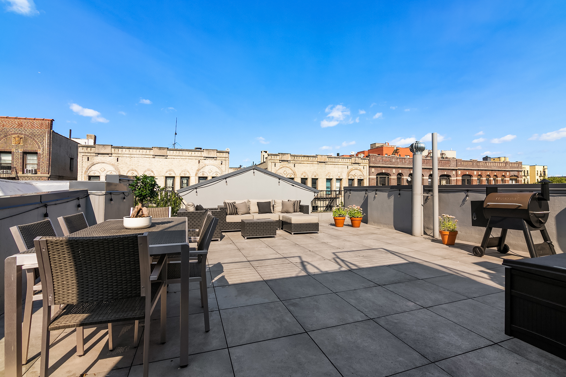 558 West 150th Street, Unit 301 Manhattan, NY 10031 - Photo 7 of 8 a view of a terrace with sitting area