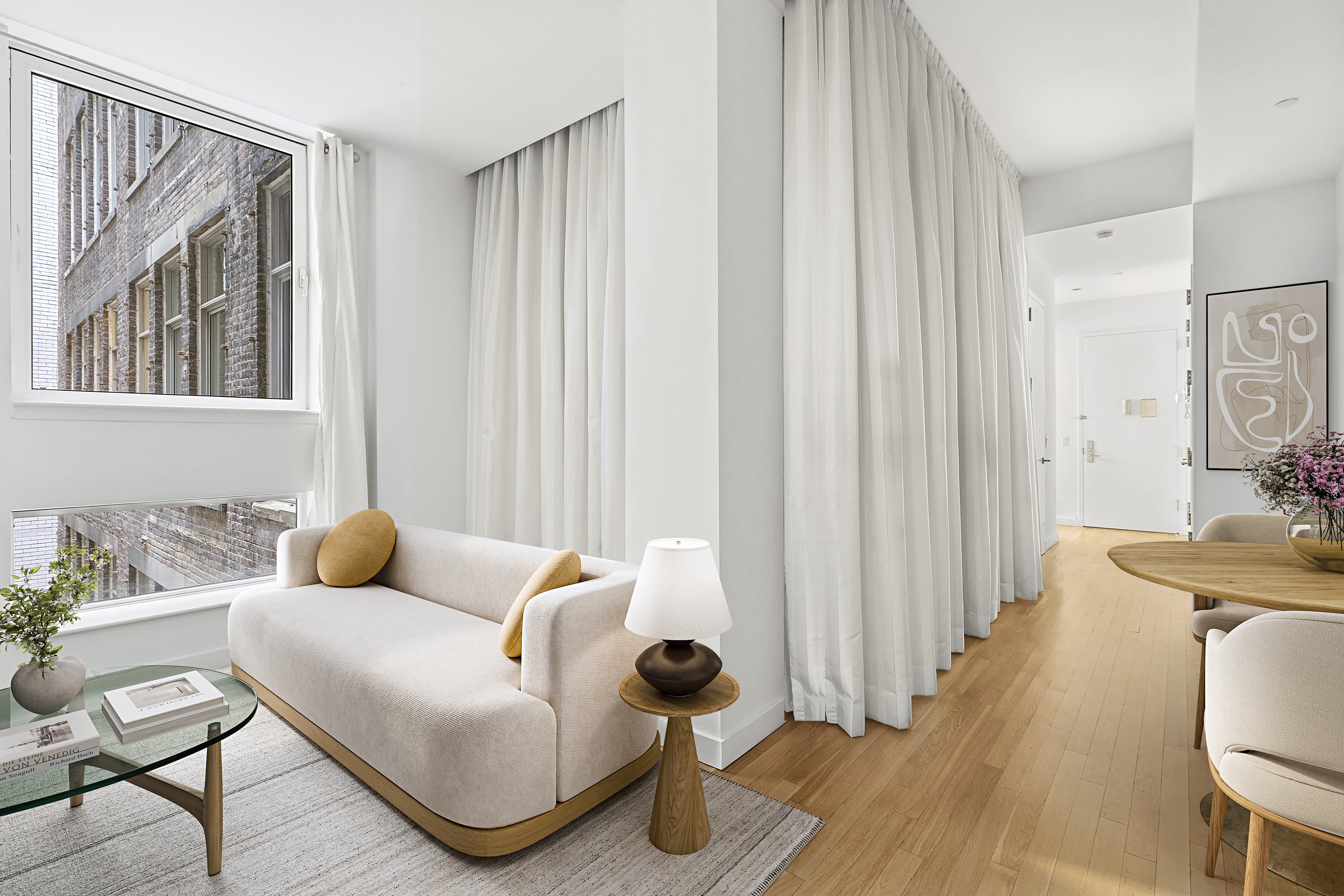 59 John Street, Unit 4H Manhattan, NY 10038 - Photo 3 of 19 a living room with furniture and a window