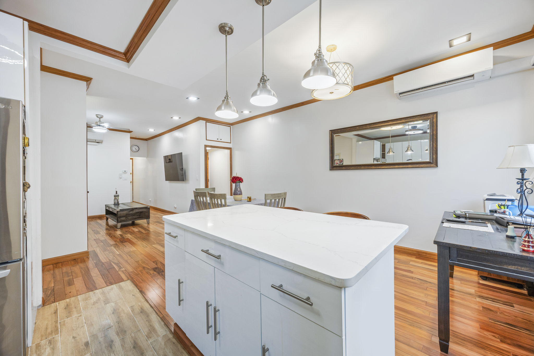 25-69 46th Street Queens, NY 11103 - Photo 22 of 33 a view of a kitchen and living room