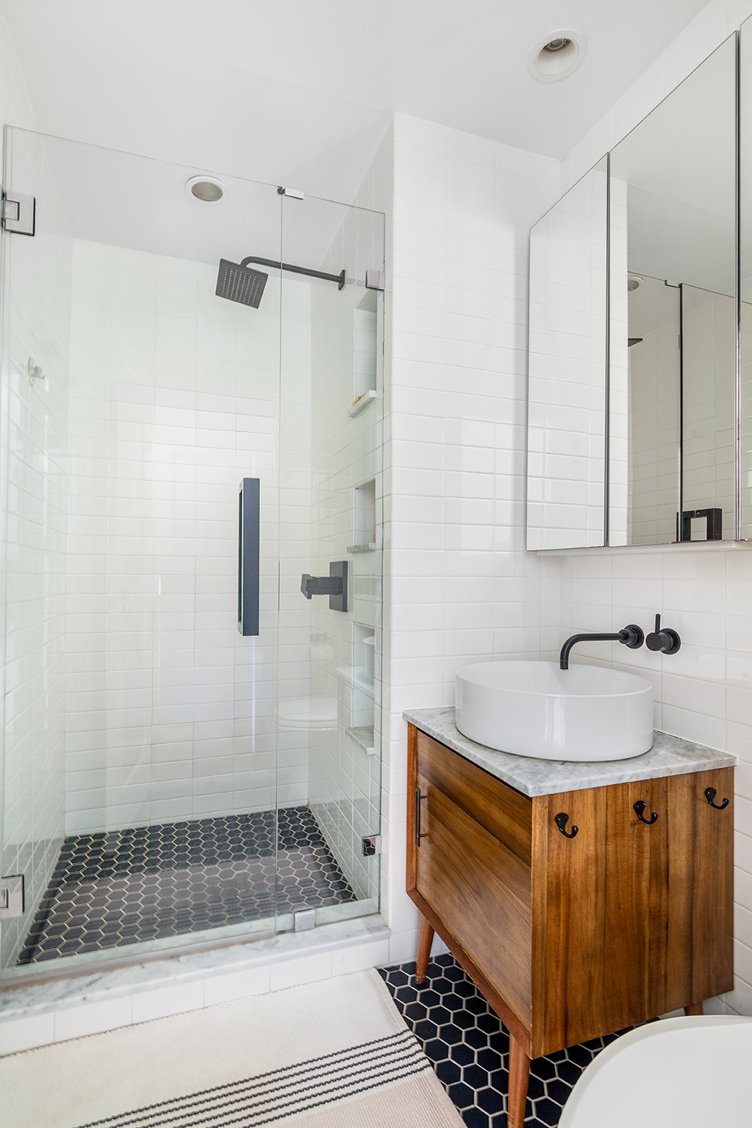 525 Ocean Parkway, Unit 2B Brooklyn, NY 11218 - Photo 7 of 12 a bathroom with a sink toilet and shower