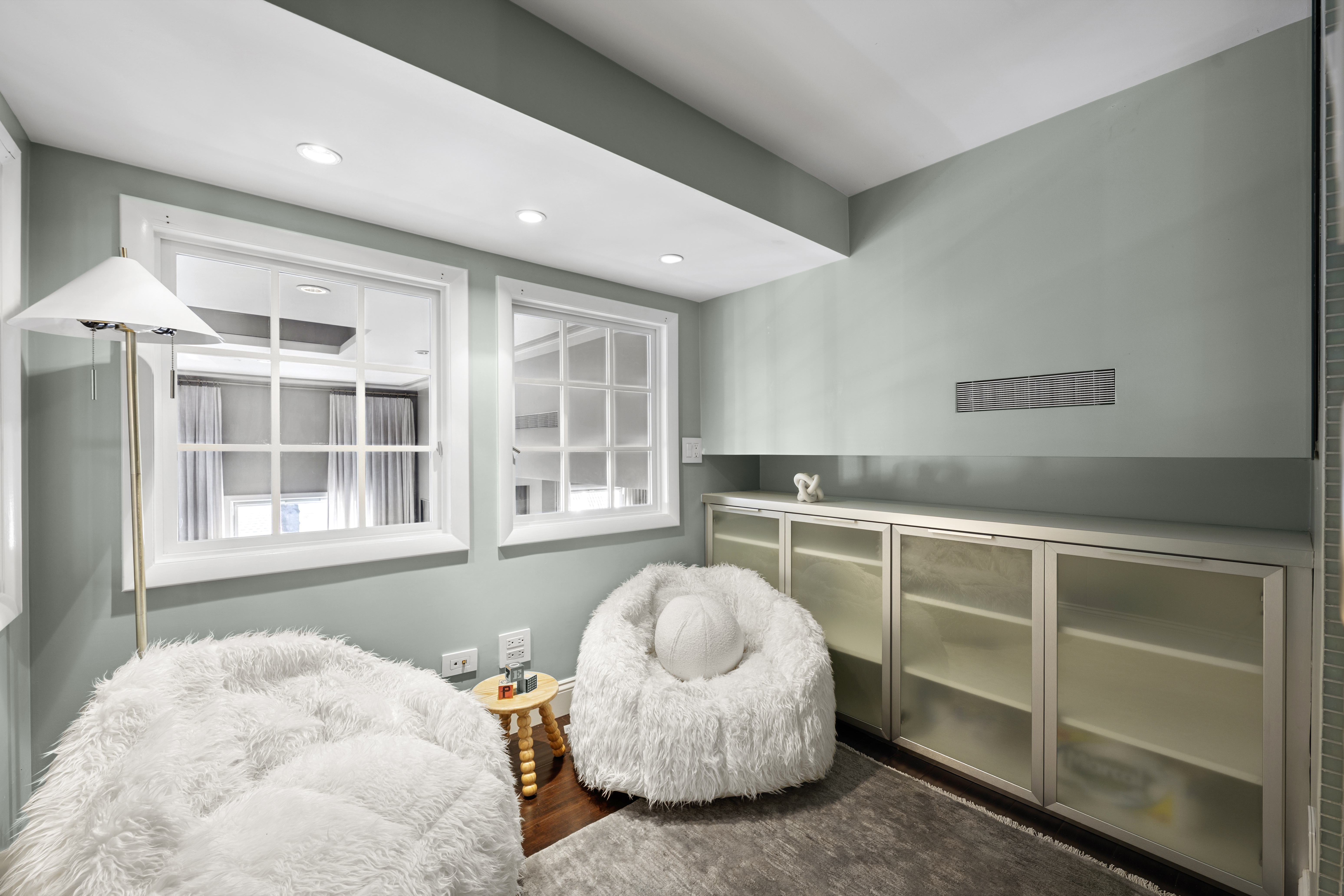 253 West 73rd Street, Unit 6B-C Manhattan, NY 10023 - Photo 14 of 21 a kitchen with a sink and cabinets