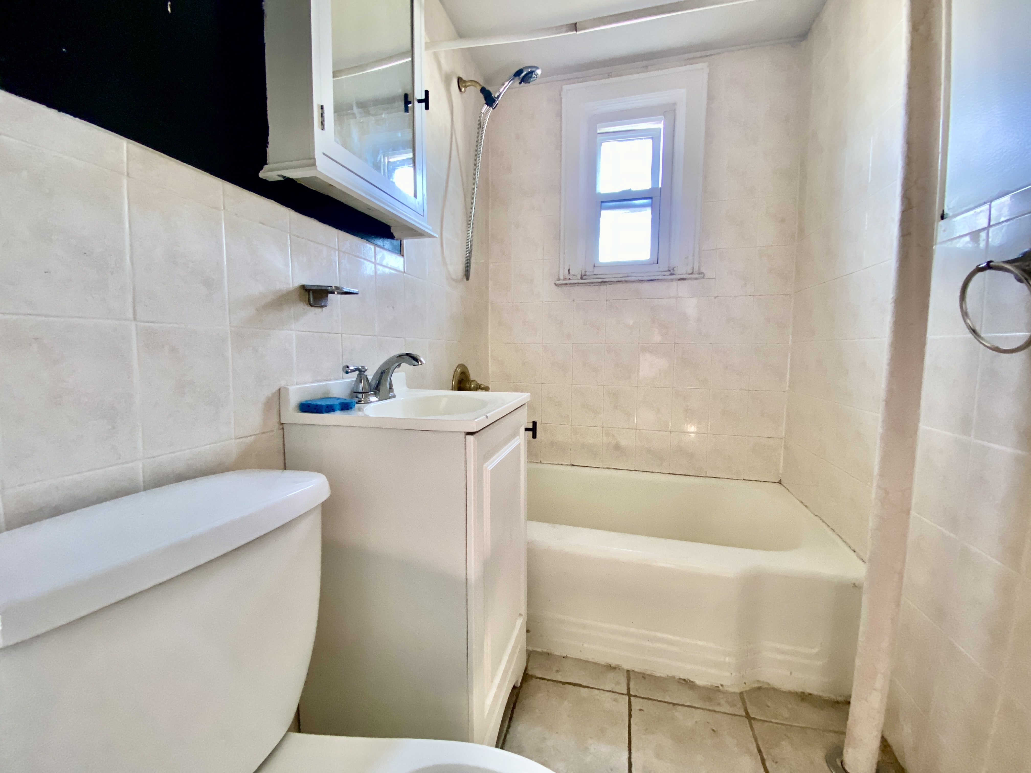 140 Washington Avenue, Unit 4 Brooklyn, NY 11205 - Photo 7 of 8 a bathroom with a sink a toilet and shower