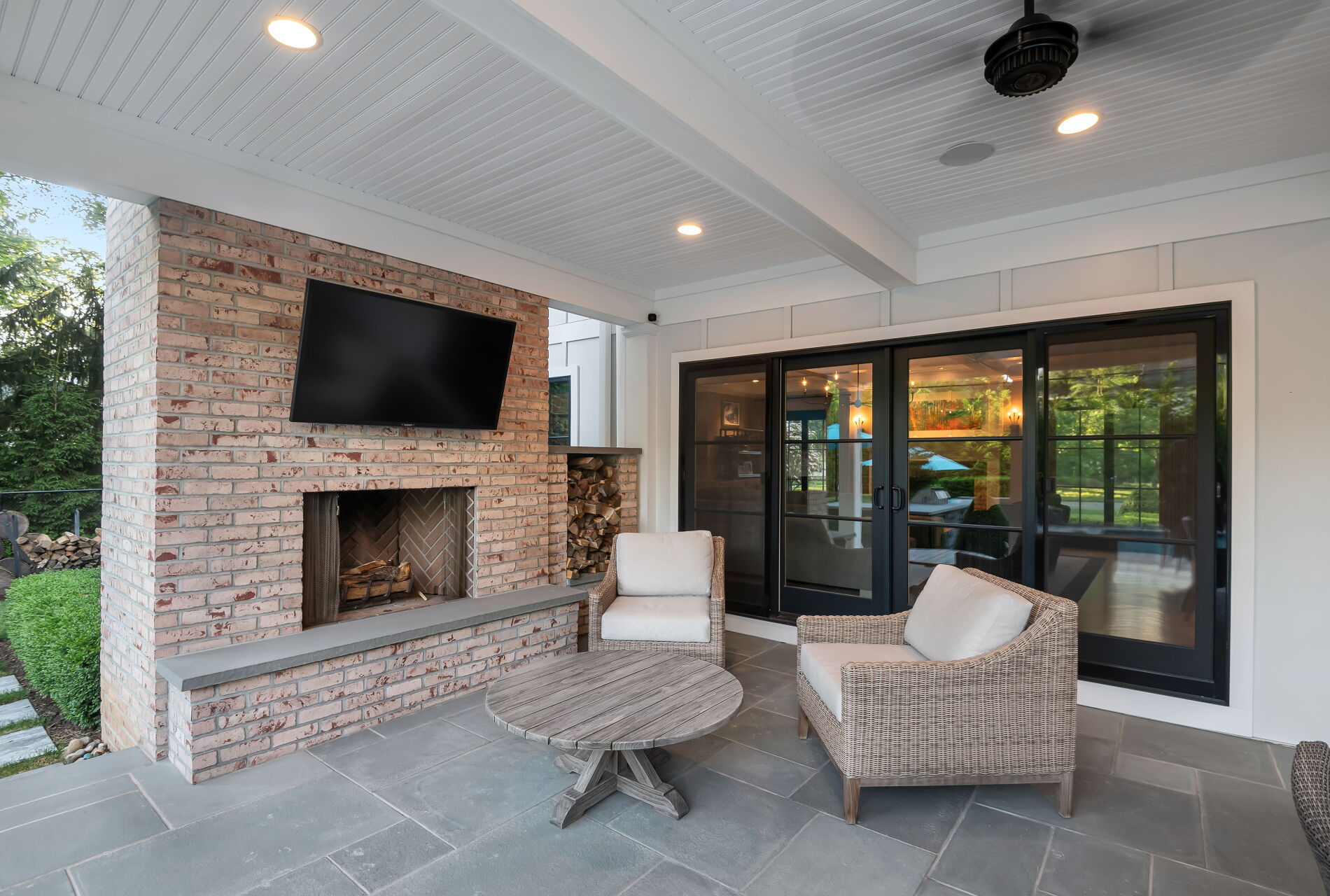 838 Seneca Road Franklin Lakes, NJ 07417 - Photo 74 of 92 a living room with furniture a flat screen tv and a fireplace