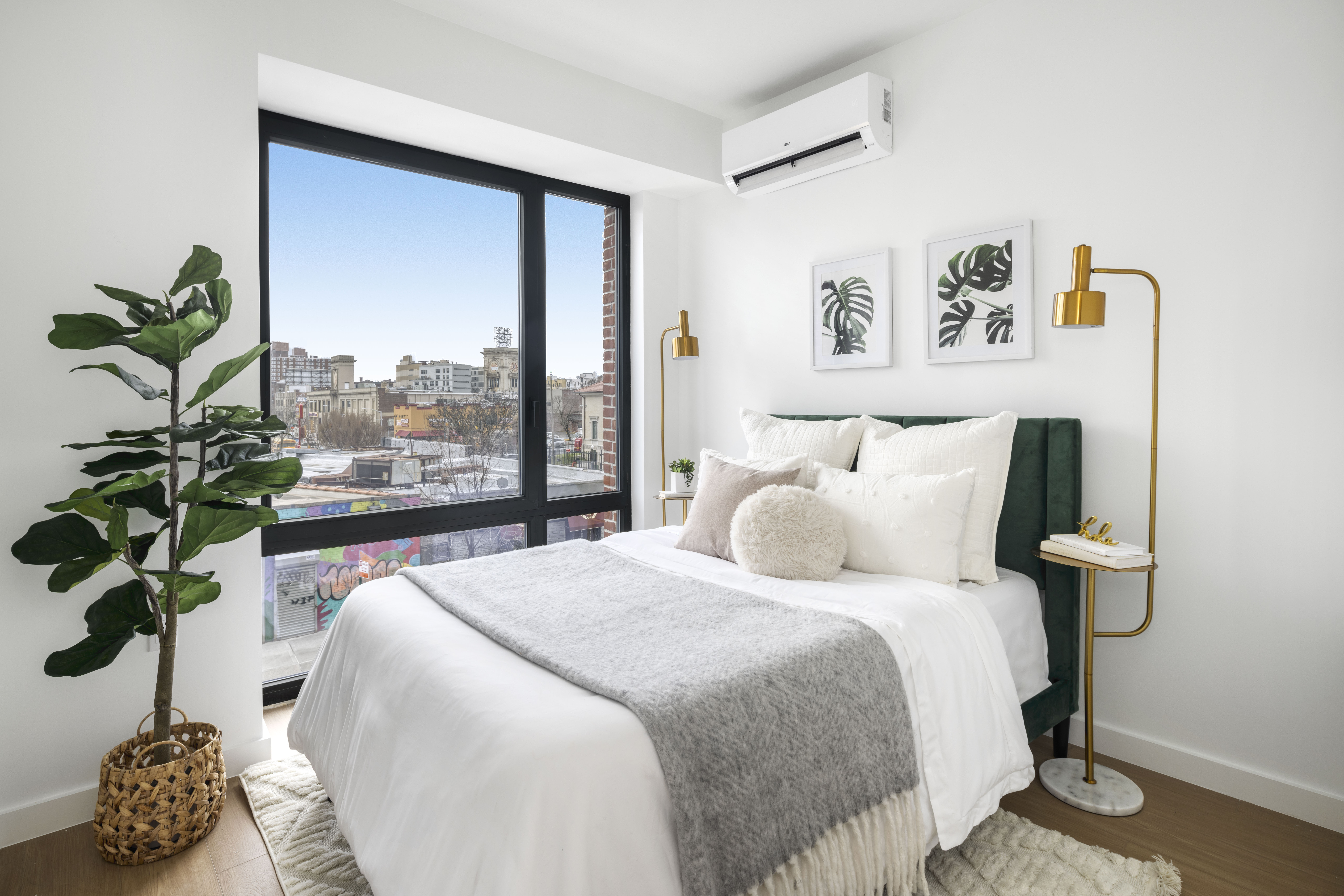 1 Sullivan Place, Unit 11A Brooklyn, NY 11225 - Photo 5 of 7 a bedroom with a bed and a potted plant