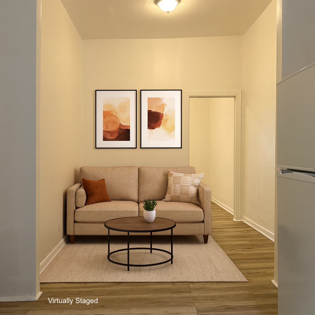 458 West 57th Street, Unit 5FE Manhattan, NY 10019 - Photo 3 of 14 a living room with furniture and a rug