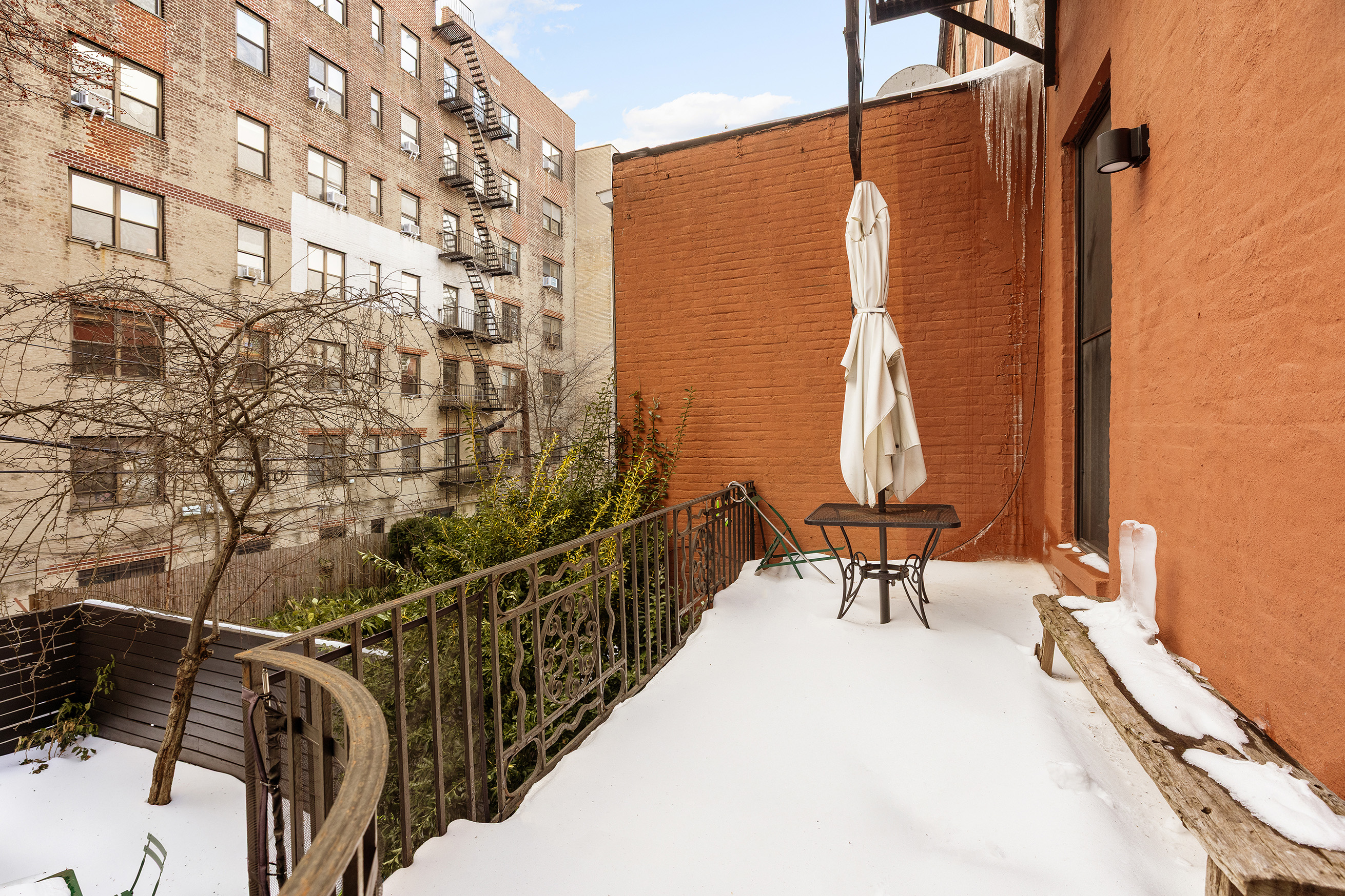 240 St Johns Place, Unit 1 Brooklyn, NY 11217 - Photo 11 of 13 a balcony with table and chairs