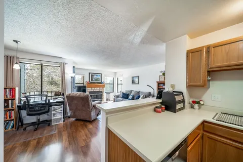 a view of a living room and dining room