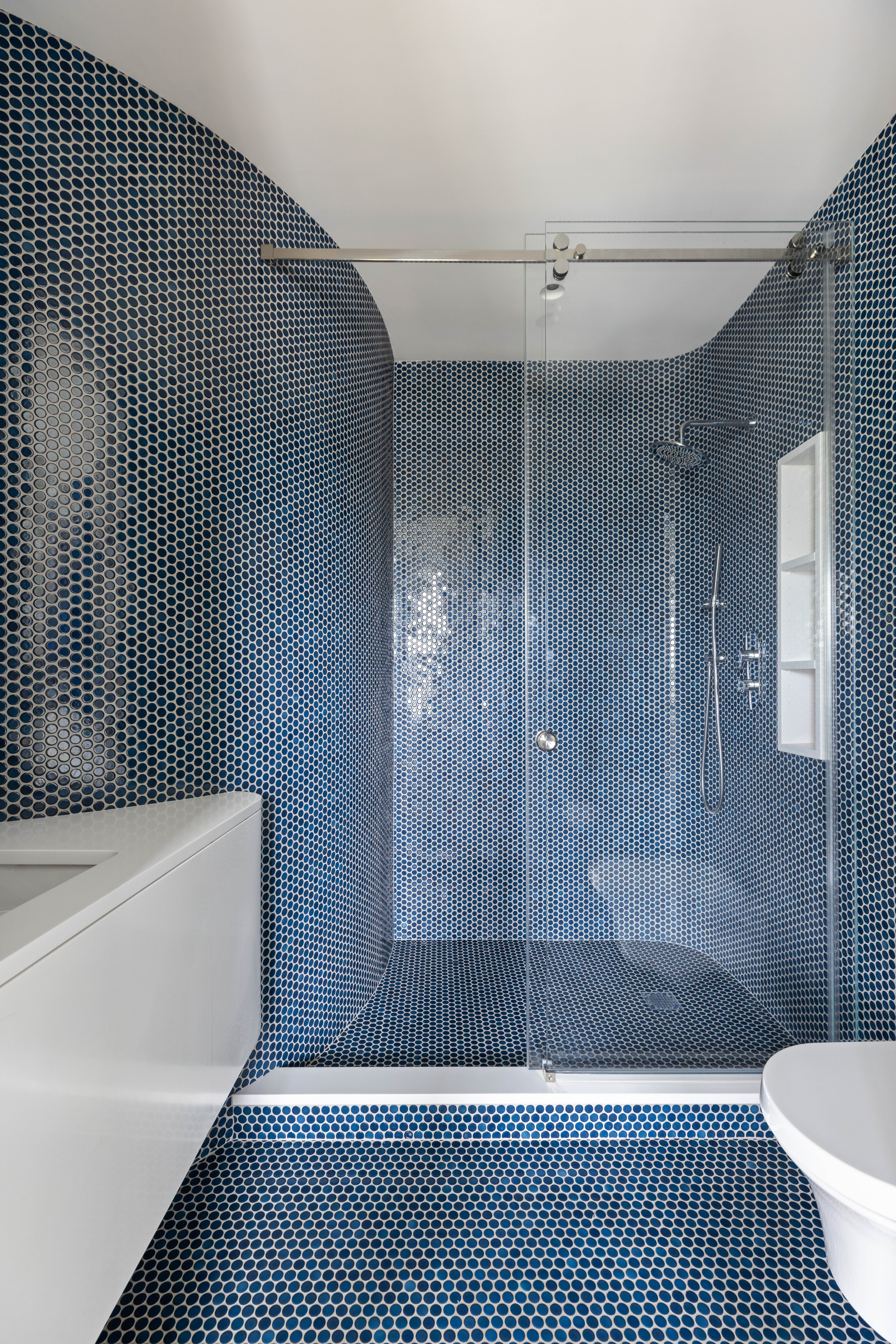 535 1st Street Brooklyn, NY 11215 - Photo 23 of 36 a bathroom with a bathtub and a shower