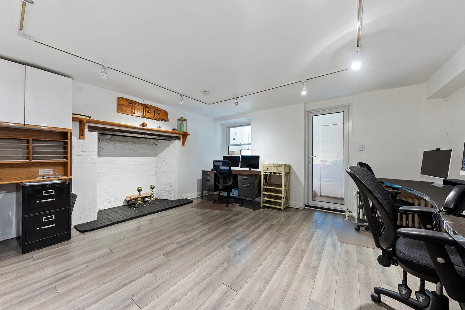 a room with furniture and a wooden floor