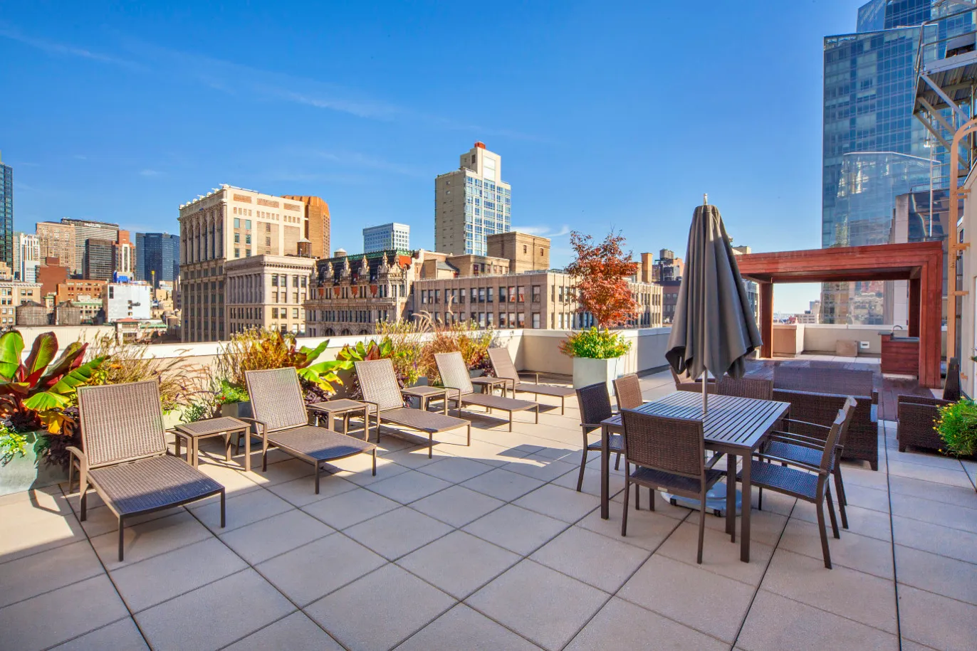 a view of a terrace with furniture