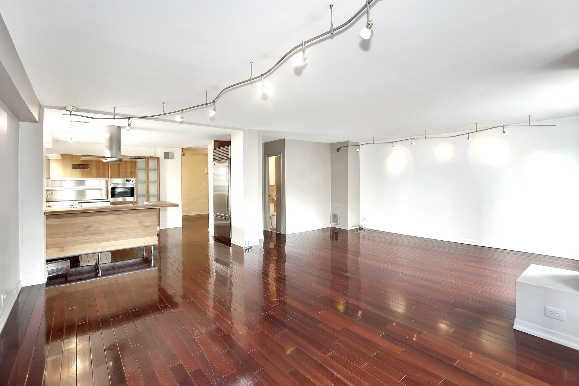 220 East 60th Street, Unit 7CD Manhattan, NY 10022 - Photo 10 of 11 a view of a living room