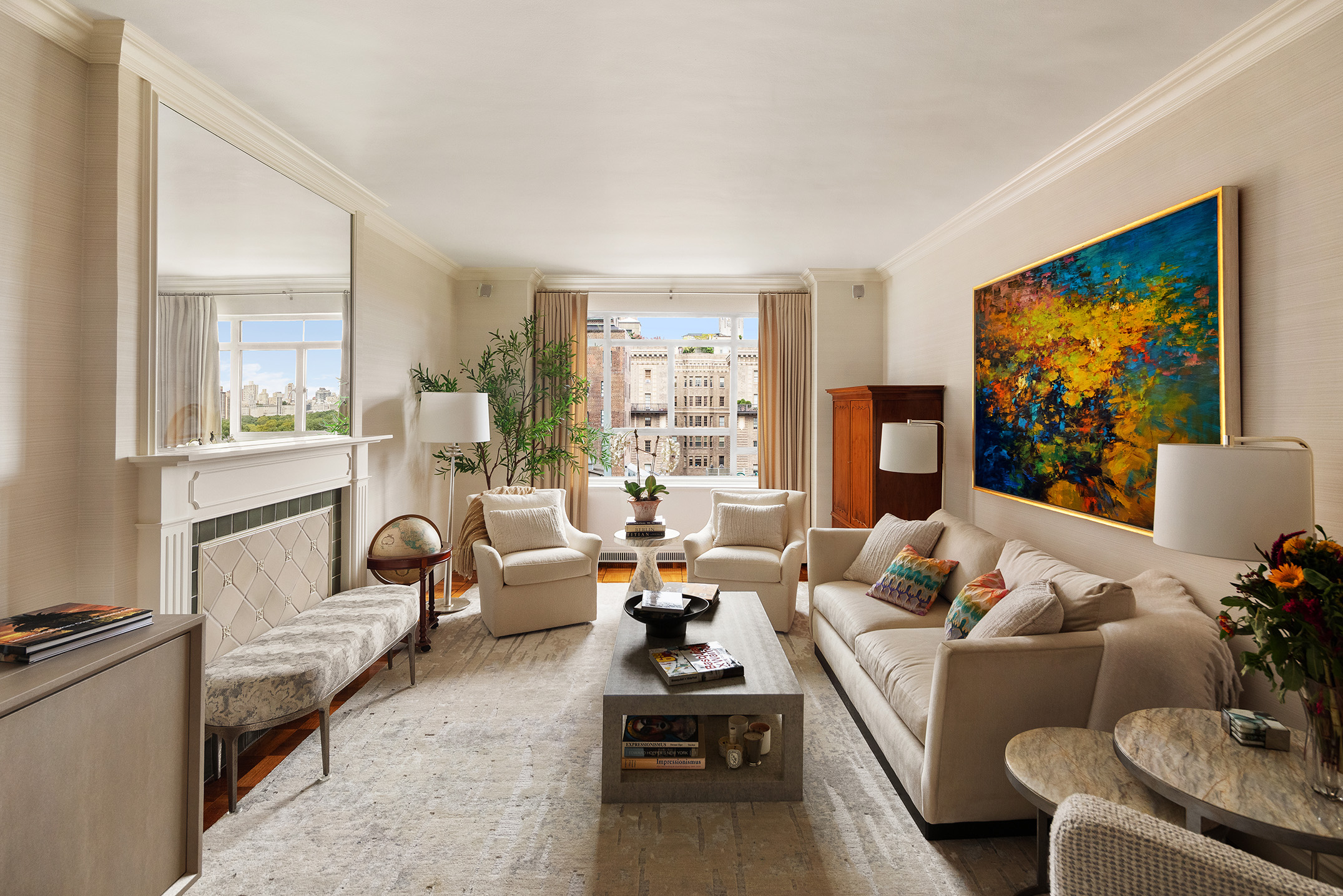 25 Central Park West, Unit 14R Manhattan, NY 10023 - Photo 2 of 22 a living room with furniture and a flat screen tv