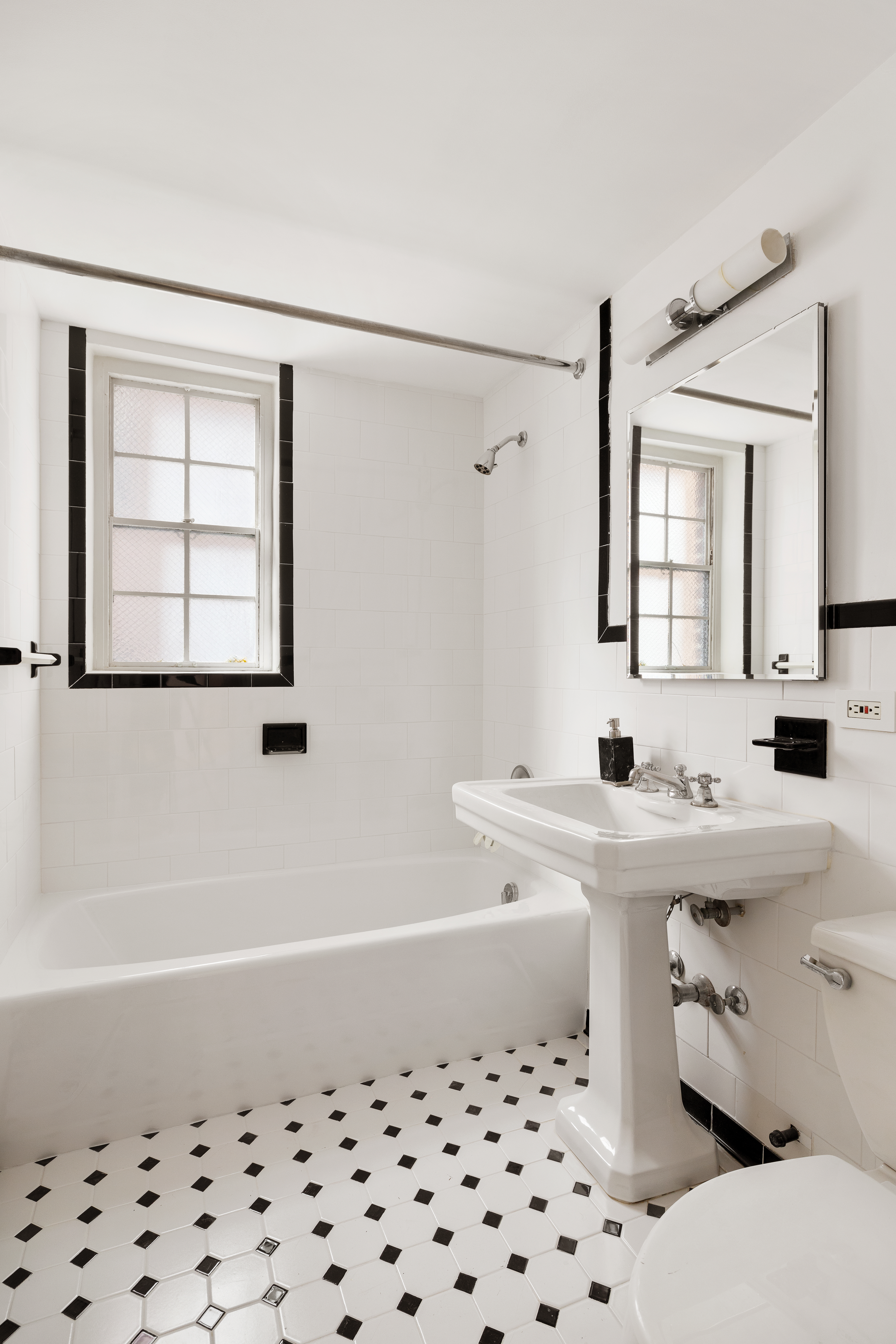 2 Horatio Street, Unit 2PR Manhattan, NY 10014 - Photo 12 of 14 a bathroom with a sink a toilet and a bathtub