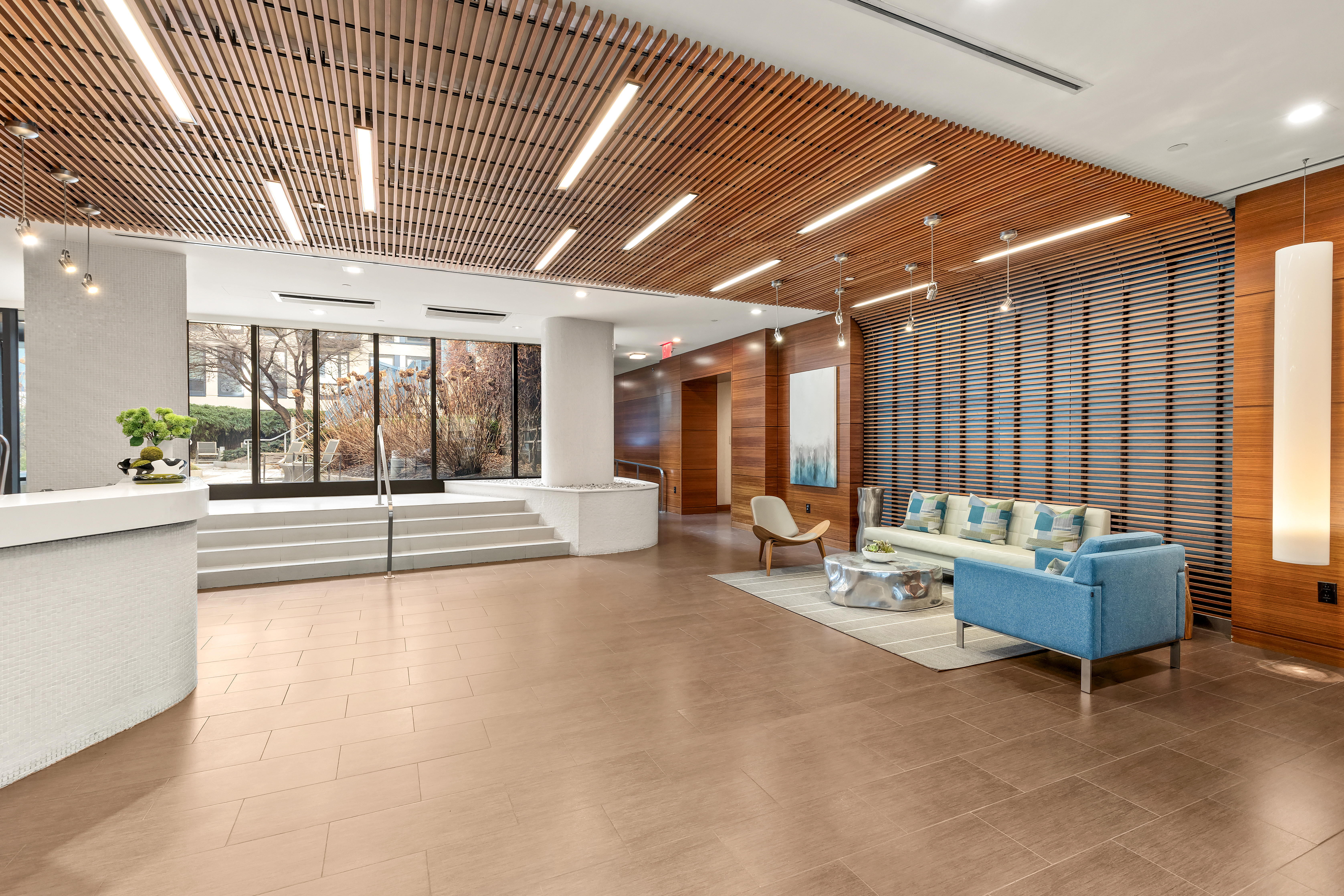 454 West 54th Street, Unit 5G Manhattan, NY 10019 - Photo 16 of 17 a lobby with furniture and large window