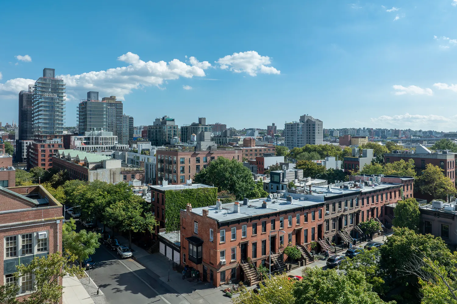 a view of a city from a balcony