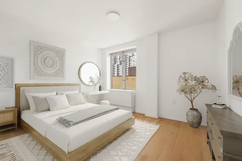 a bathroom with a toilet a sink and bathtub