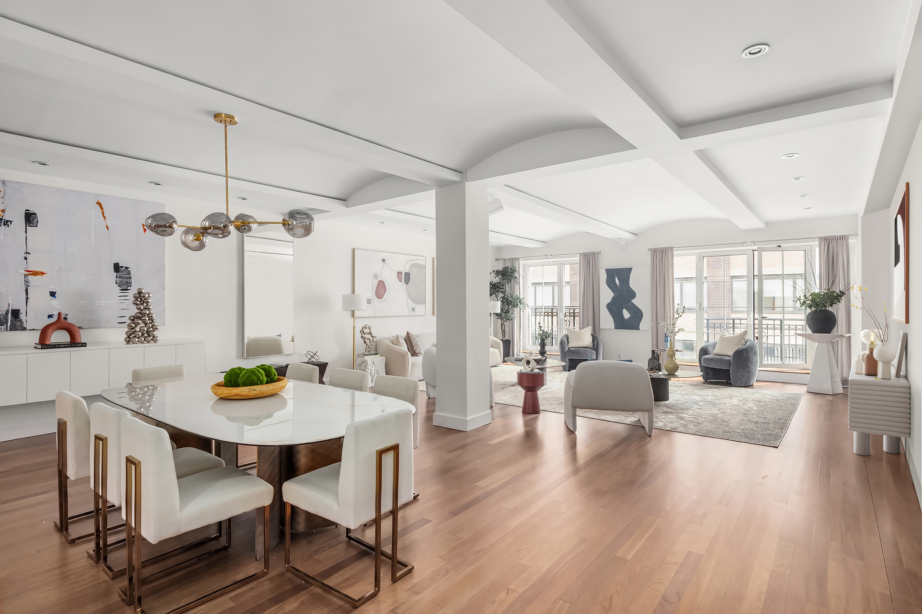 43 West 64th Street, Unit 7A Manhattan, NY 10023 - Photo 2 of 20 a view of a dining room with furniture wooden floor and chandelier