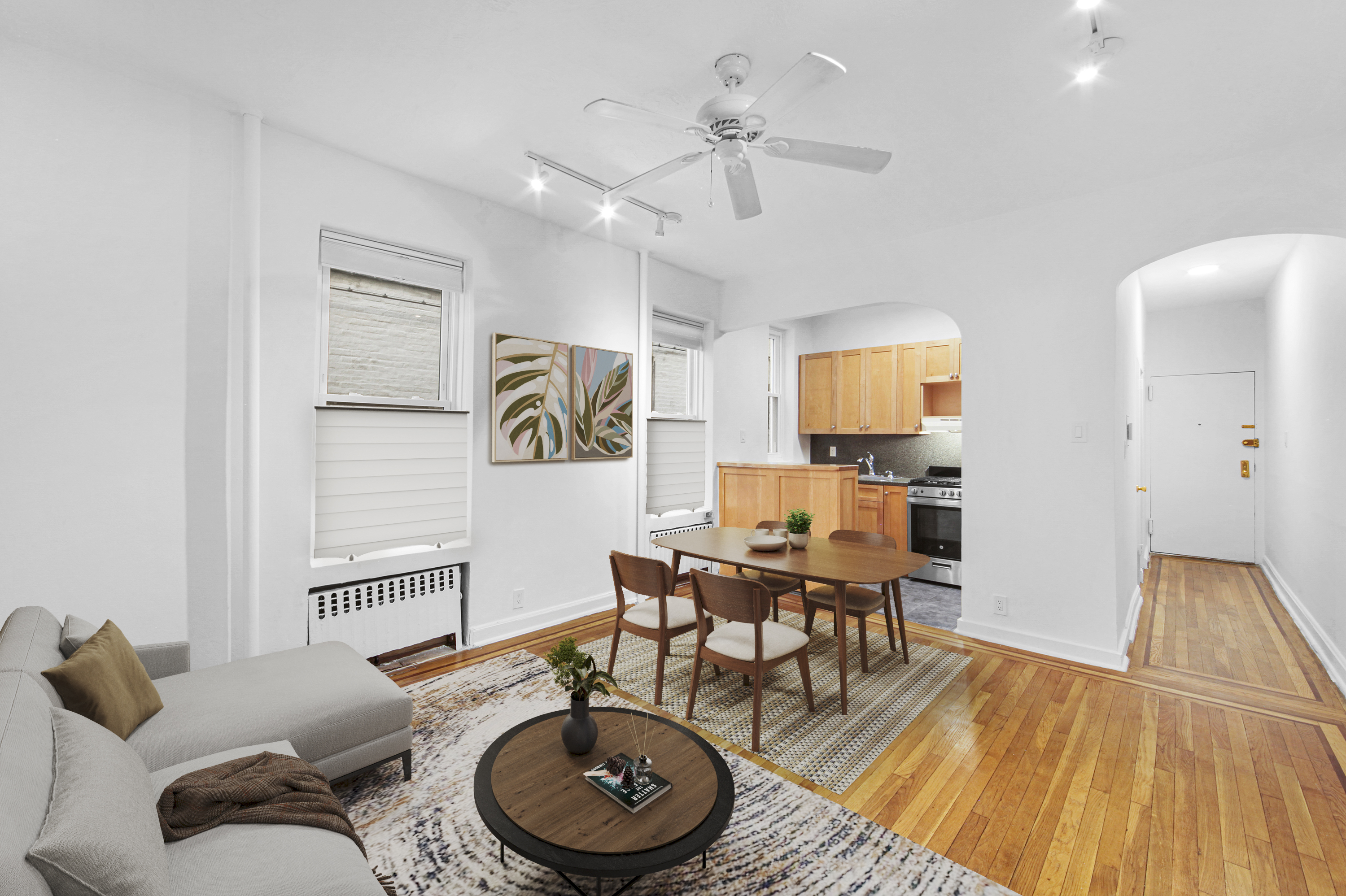 231 Park Place, Unit 12 Brooklyn, NY 11238 - Photo 2 of 18 a living room with furniture and a wooden floor