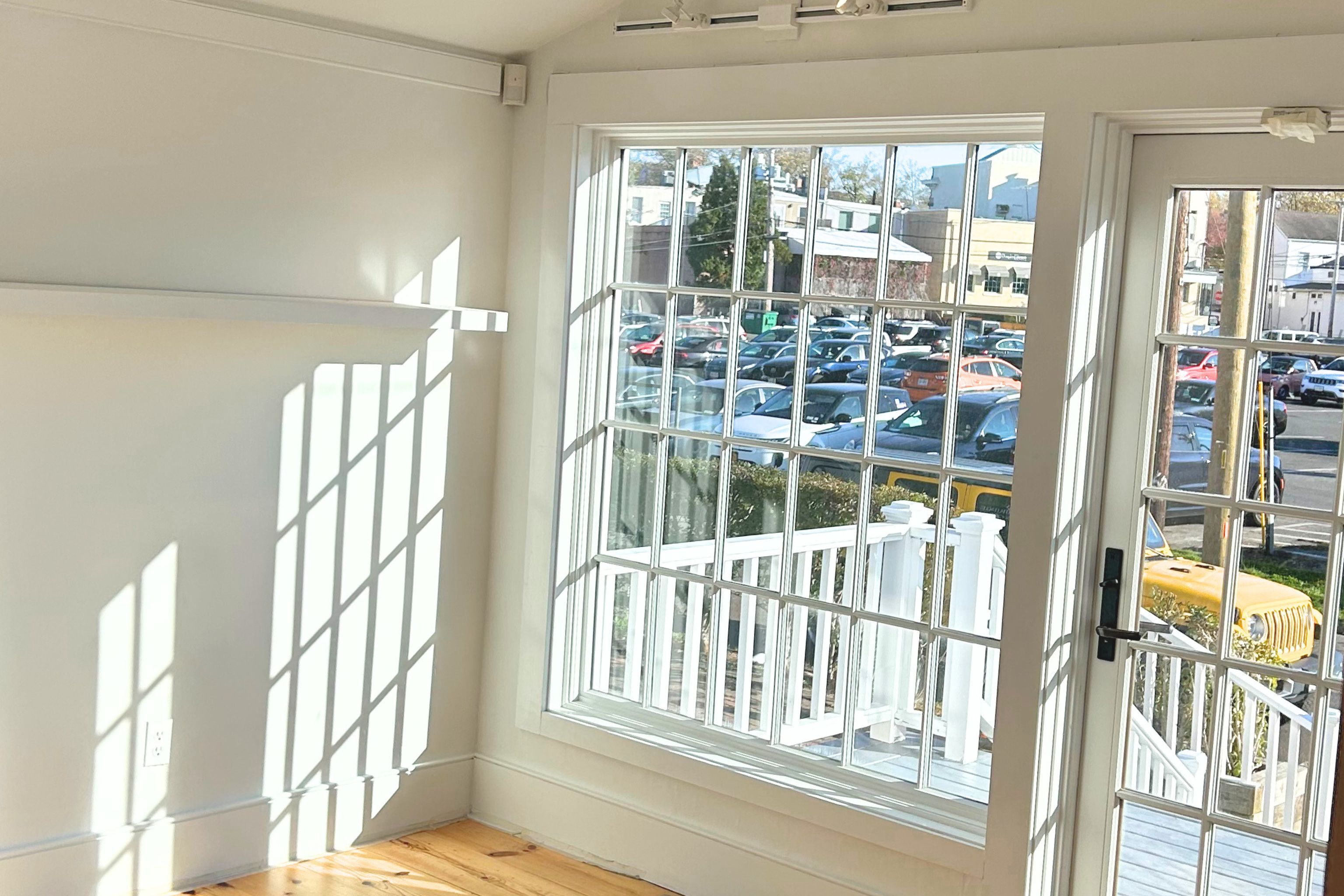 23 Bridge Street Sag Harbor, NY 11963 - Photo 14 of 25 a view of staircase with a large window