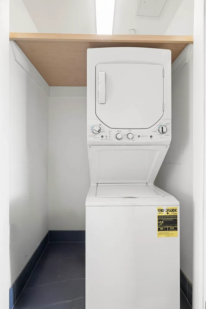 a storage room with washer and dryer