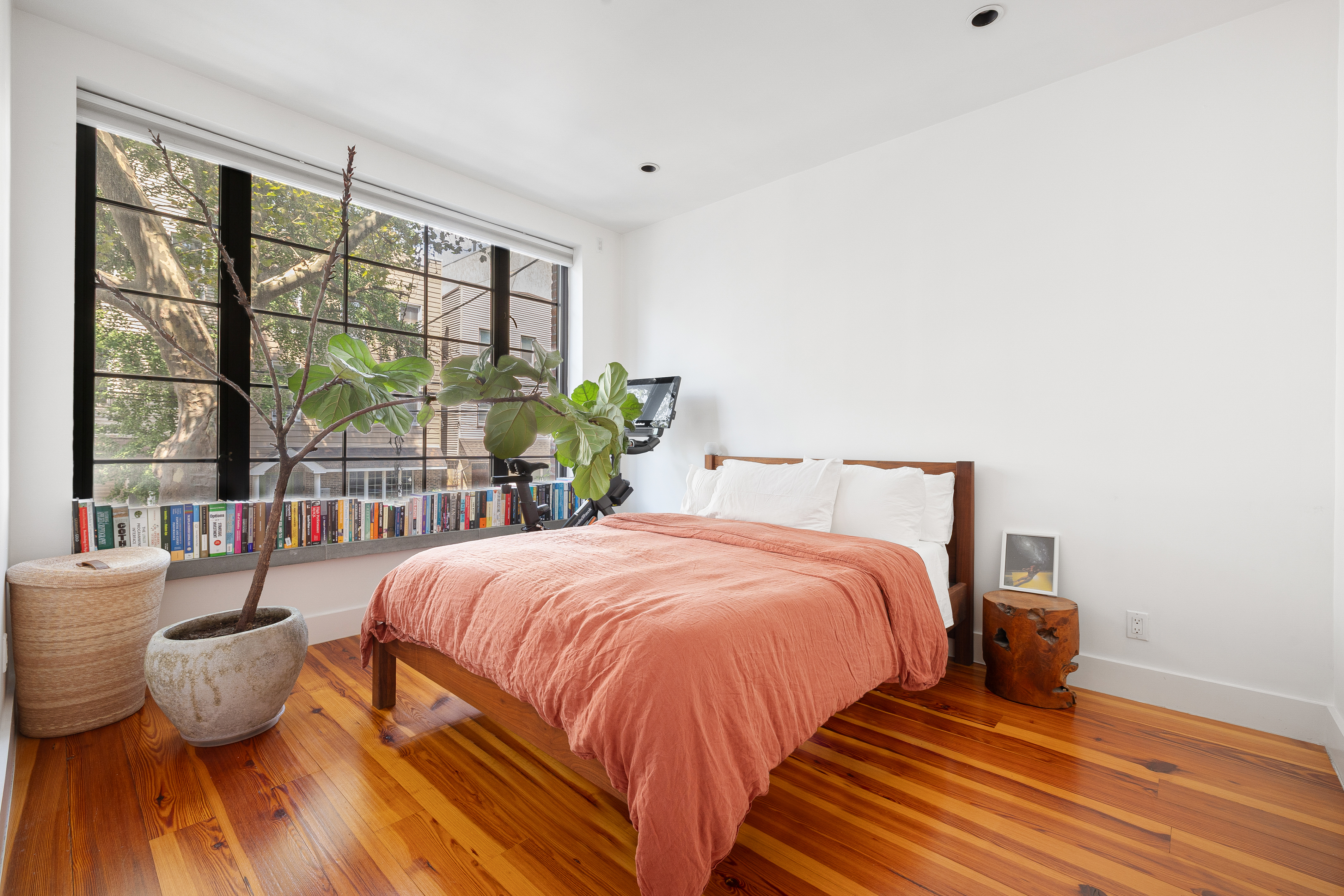 174 Jackson Street, Unit 2A Brooklyn, NY 11211 - Photo 9 of 17 a bedroom with a bed and a large window