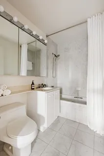 a view of a building with sitting area