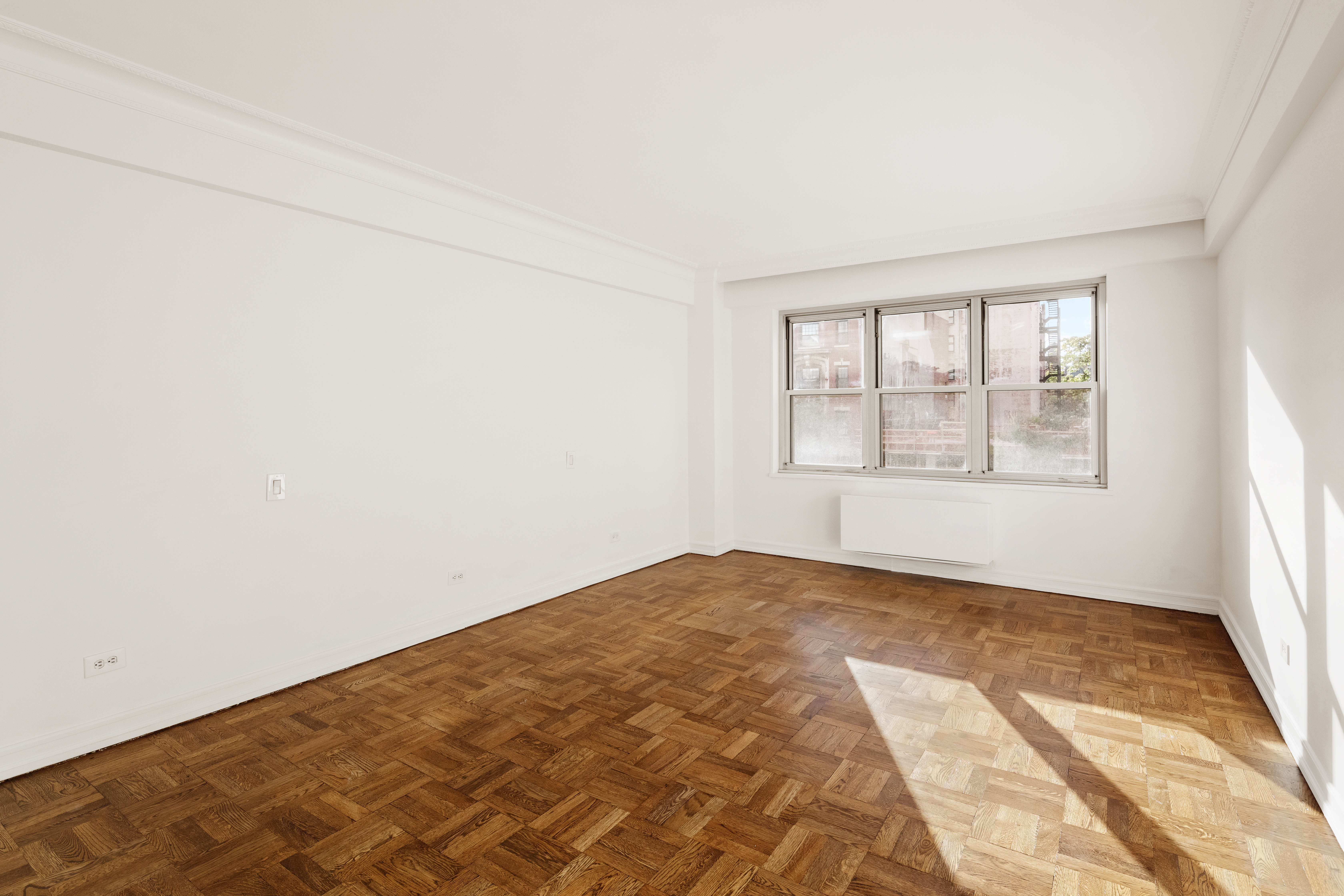 11 5th Avenue, Unit 5LW Manhattan, NY 10003 - Photo 10 of 19 an empty room with a window