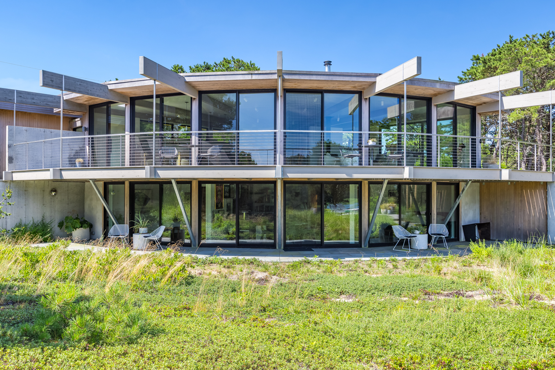 375 King Phillip Road Wellfleet, MA 02667 - Photo 2 of 27 a view of a house with a yard balcony and sitting area