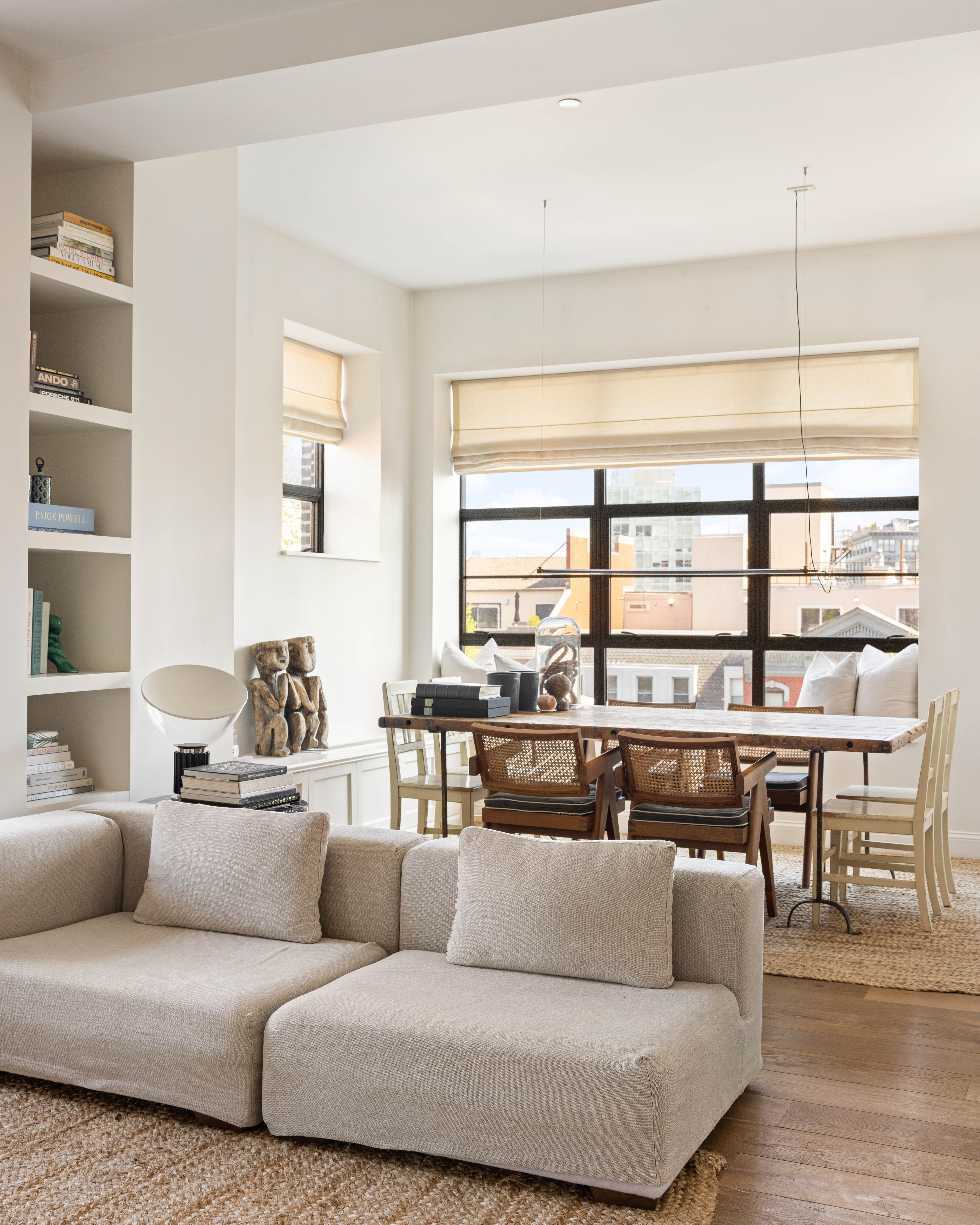 20 Henry Street, Unit 5D/S Brooklyn, NY 11201 - Photo 4 of 15 a living room with furniture and a large window
